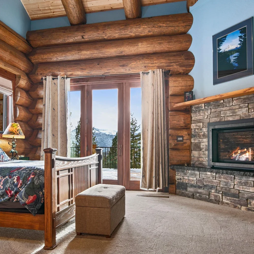 modern-log-cabin-bedroom-views.webp