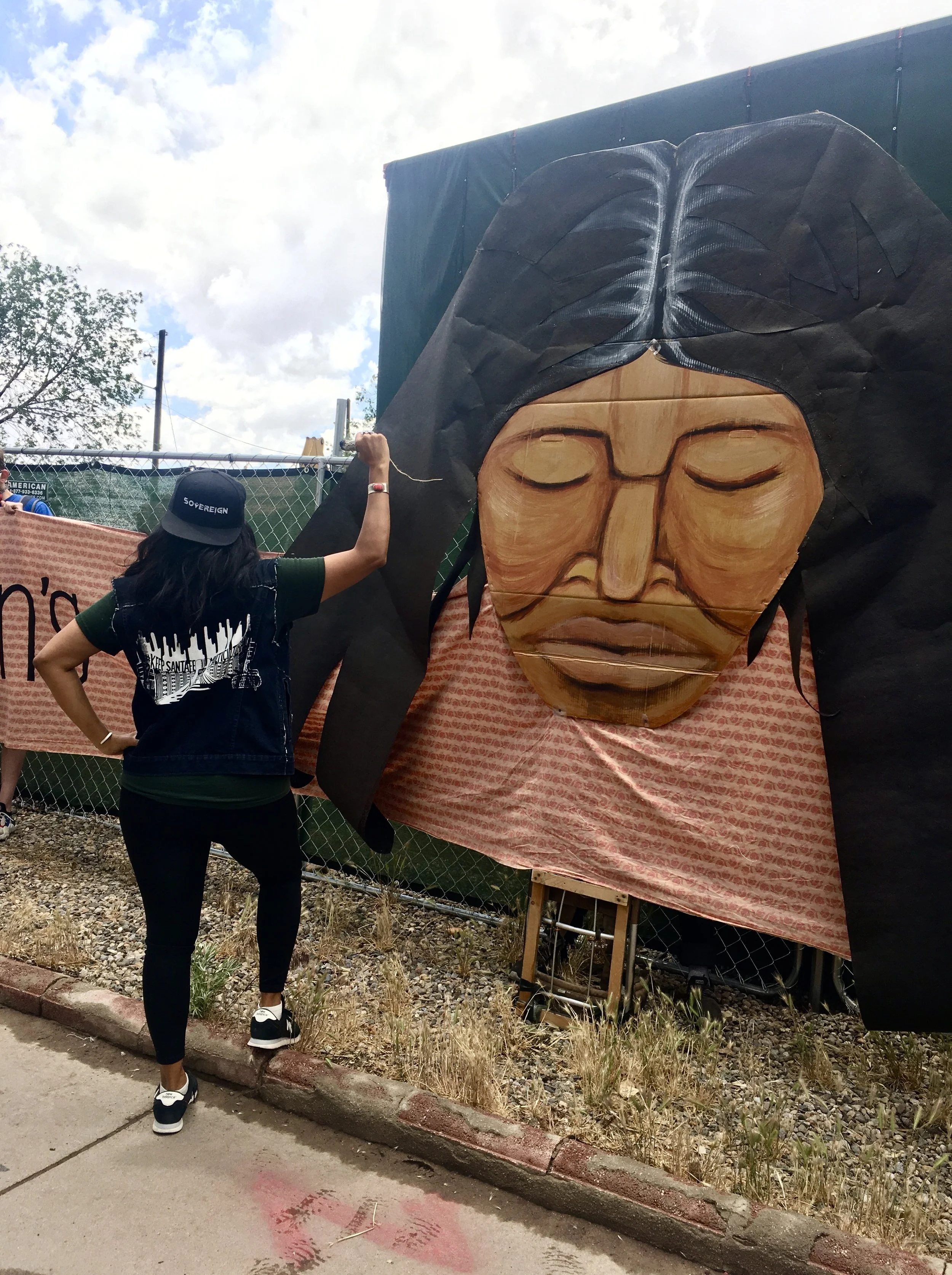 Multicultural Mural Indigenous Matriarch puppet at "Gentrification is Erasure is Gentrification" activation, O'ga P'ogeh NM, 2021