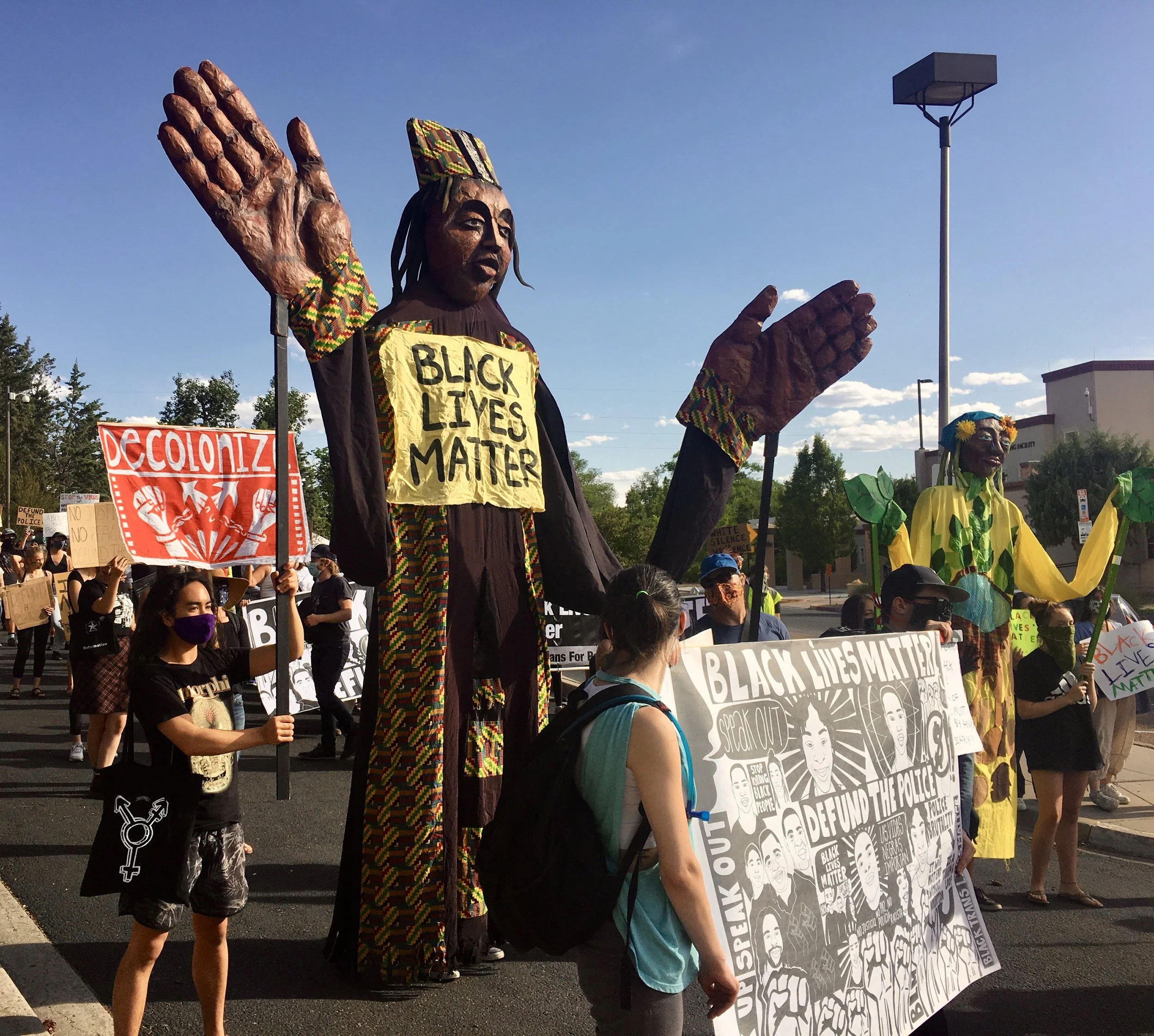 Giant puppets and banners at Black Lives Matter March, O'ga P'ogeh (Santa Fe) NM 2020