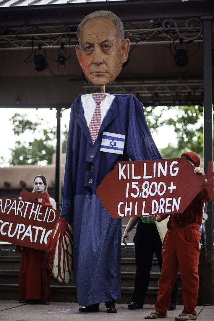People's Tribunal Street Theatre created and performed by community on Netanyahu's first visit to congress while committing genocide in Palestine, 2024, Santa Fe Plaza.