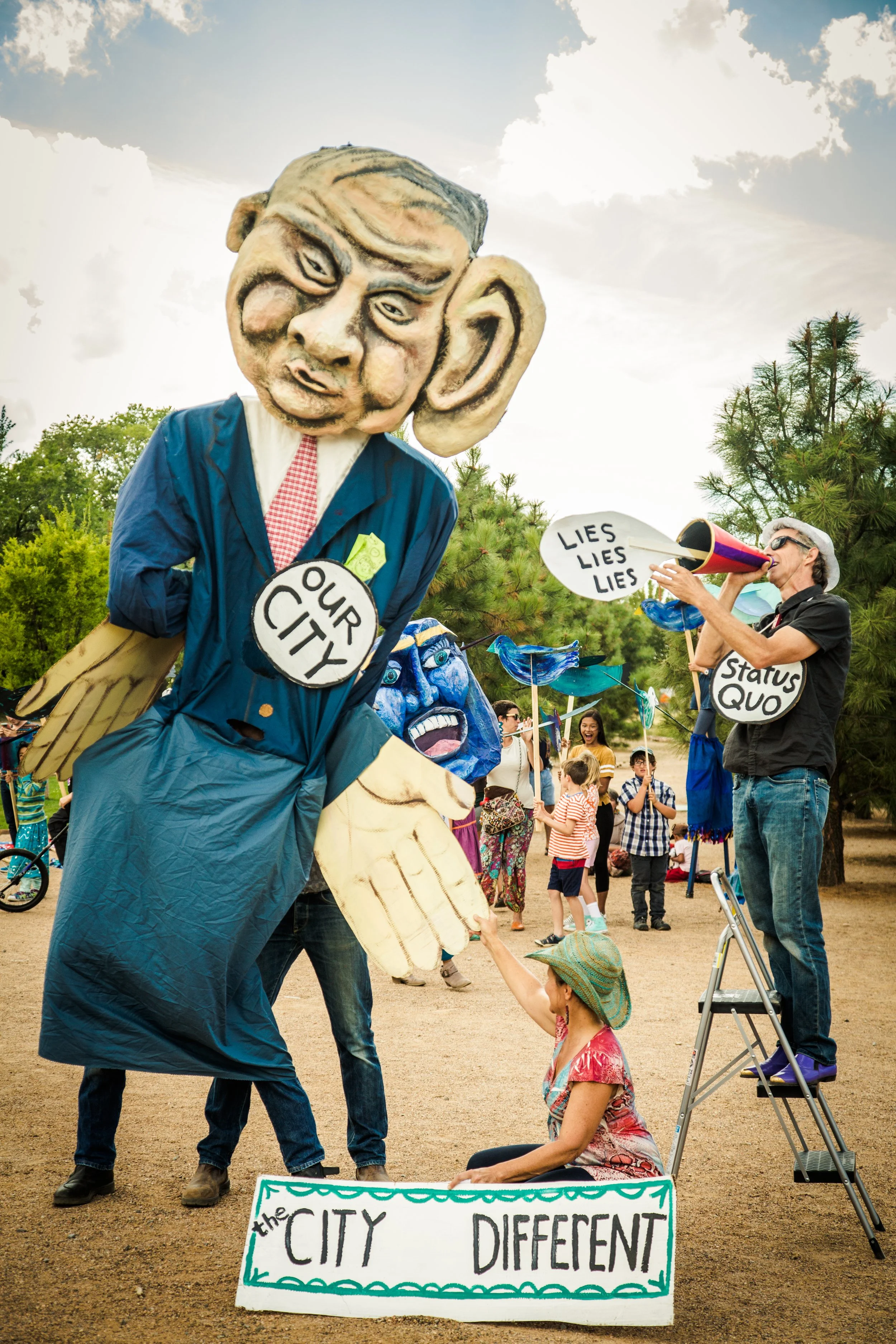 Big Ear for Business (small ear for the people) politician puppet in community street theatre production, 2017, O'ga P'ogeh (Santa Fe) NM