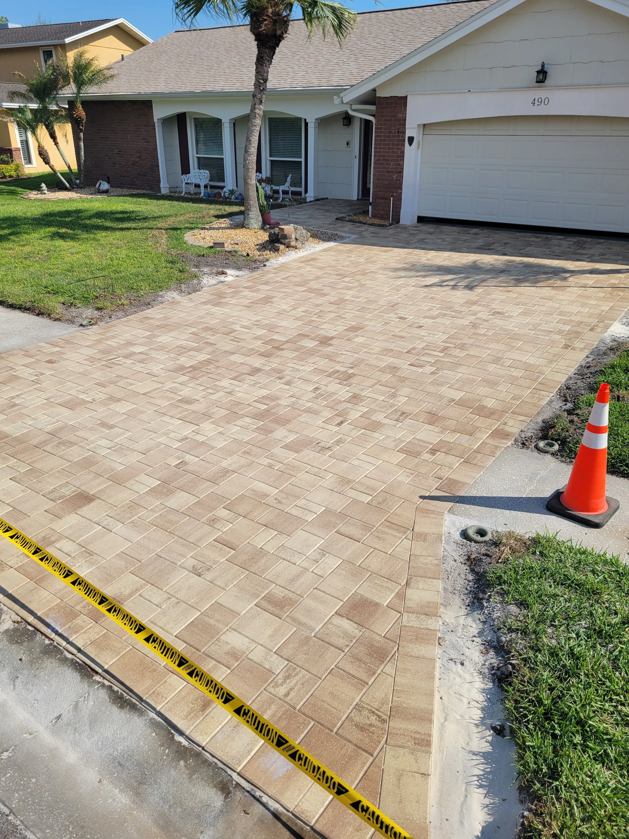 Paver Sealing vs Pressure Washing: What’s the Difference?
