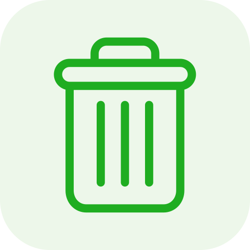 A young woman with dark hair styled in a messy bun and wispy bangs, with yellow-green eyes, wearing small hoop earrings, a gold necklace, and a nose ring, against a pink background.