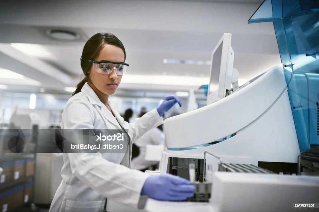 Lab worker performing pre-employment drug testing