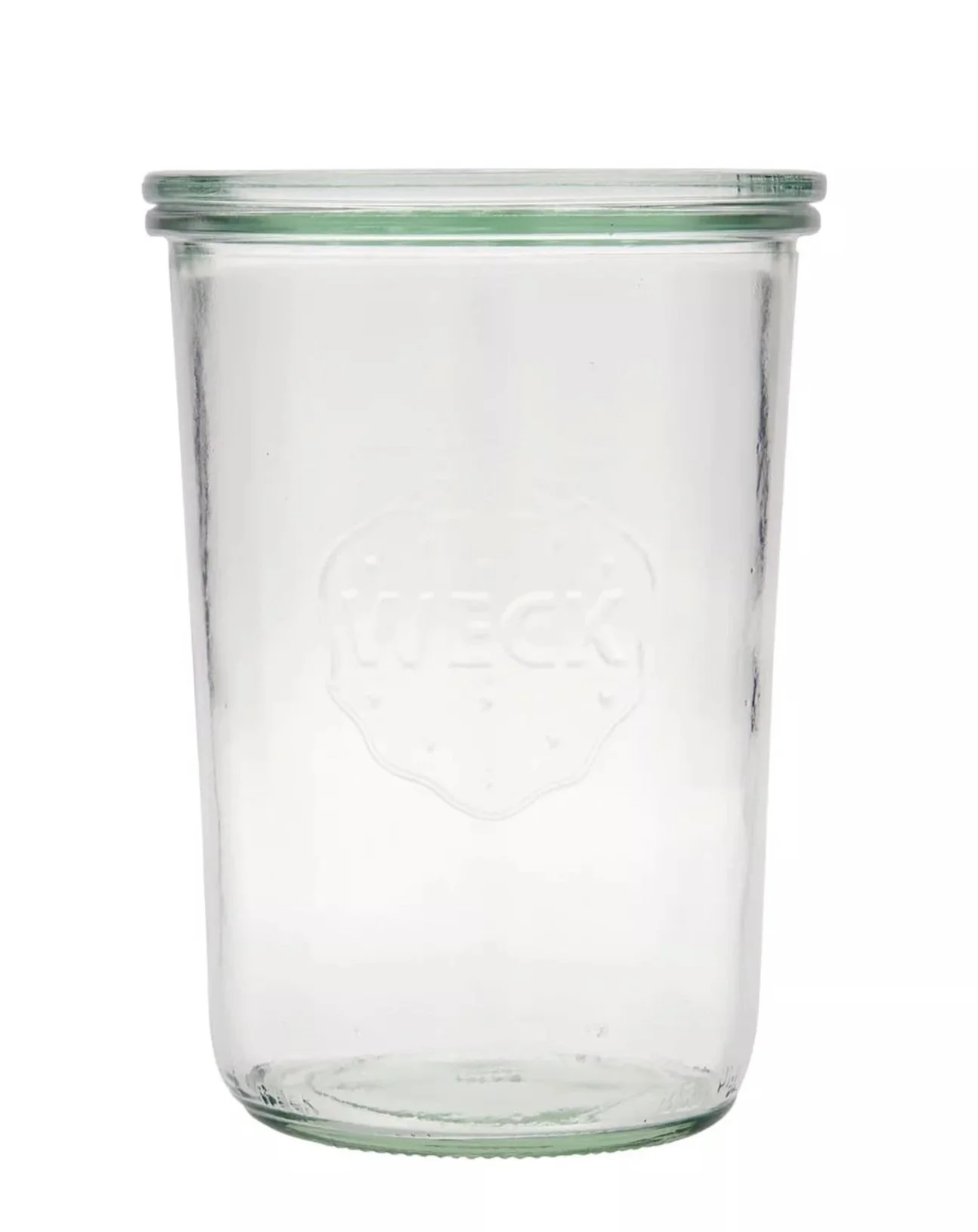 Et tomt gjennomsiktig glasskrus med grønne kanter og WECK-logo.