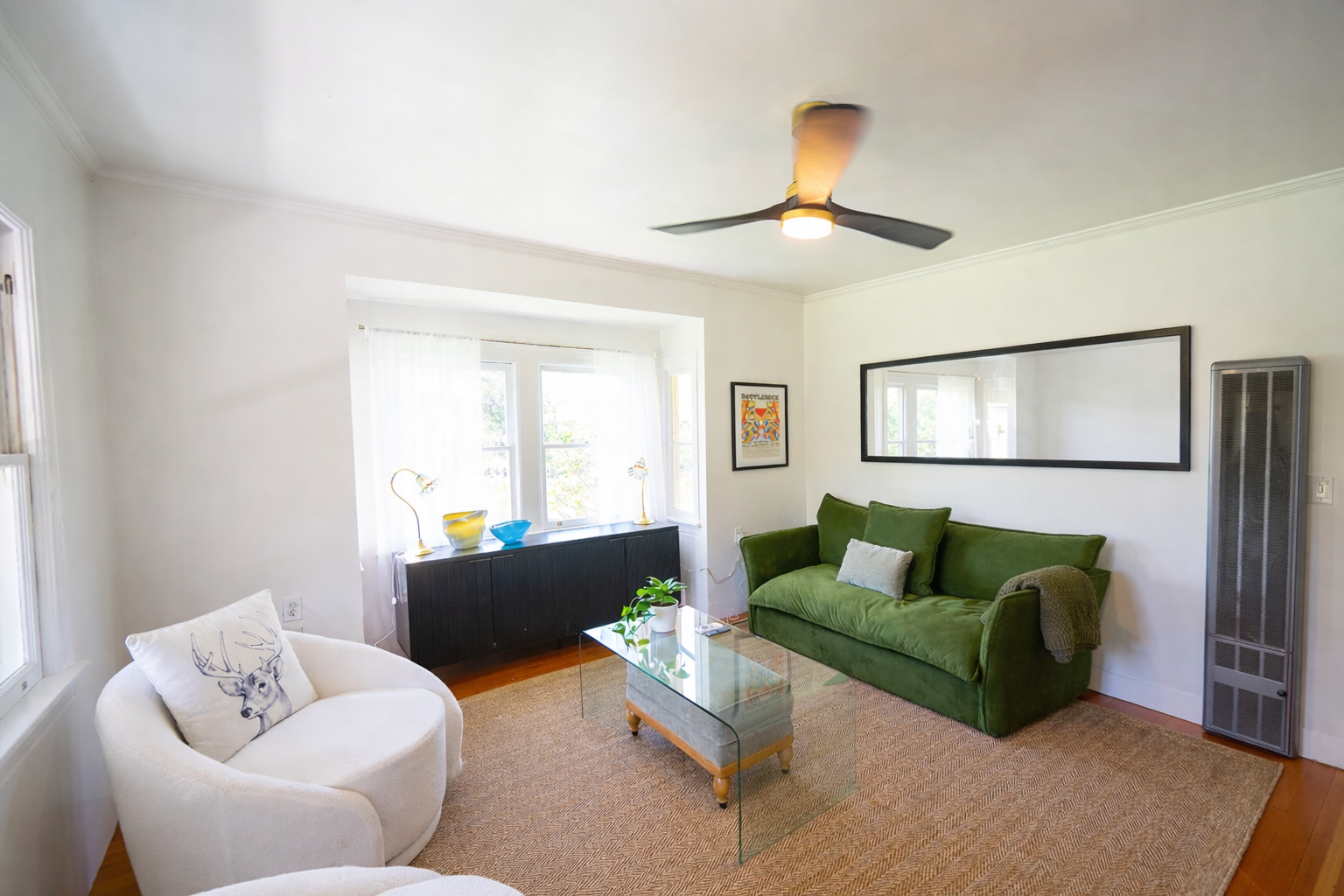 Cozy living room with green accents.png