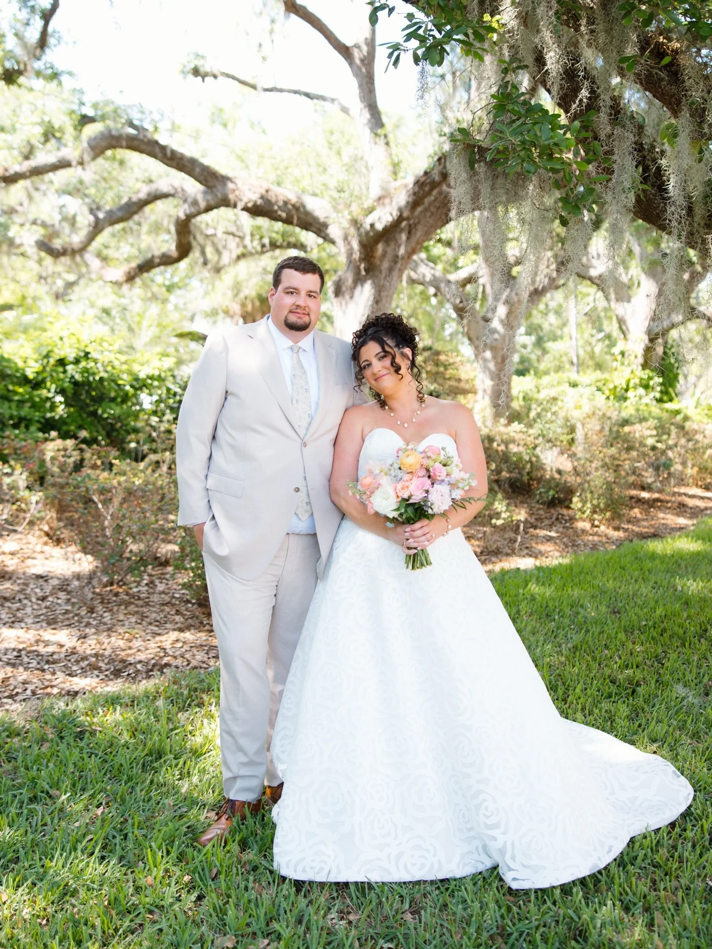 An Iconic venue for an iconic couple. If you are familiar with the Tampa Yacht and Country Club you know there are a few must have spots for photos. The beautiful hallway and the oak tree are the two most popular. Already beautiful settings on their 