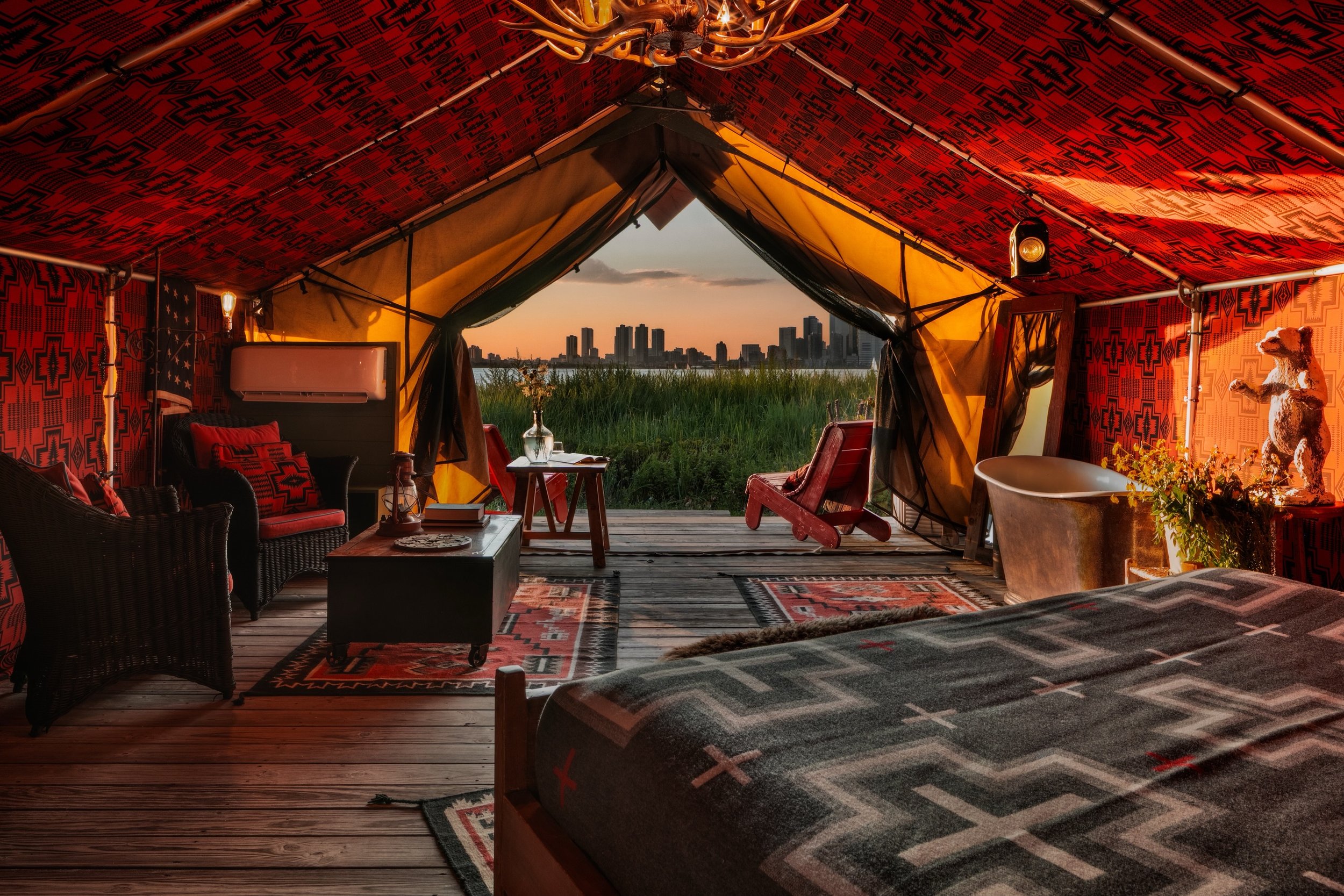 Want to go camping in NYC!? Urban Cowboy is back in the city that started it all. This time in a tent on @governorsisland. Created in collaboration with @collectiveretreats, the Urban Cowboy Tent brings our signature design of rustic-luxury aesthetic