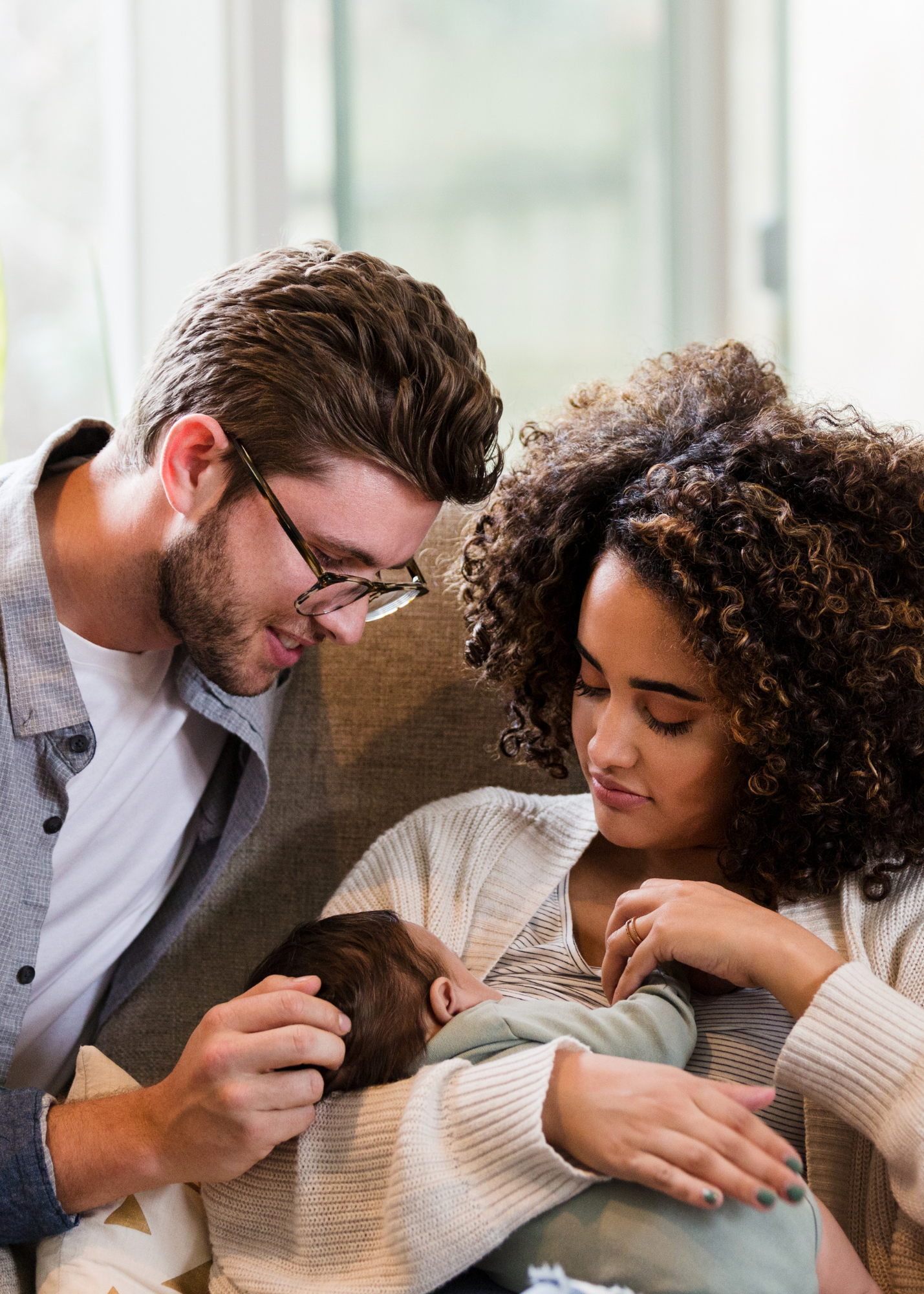 Family sharing a quiet moment of connection, symbolizing empathy and presence in Ruth Olson’s human-centered coaching.