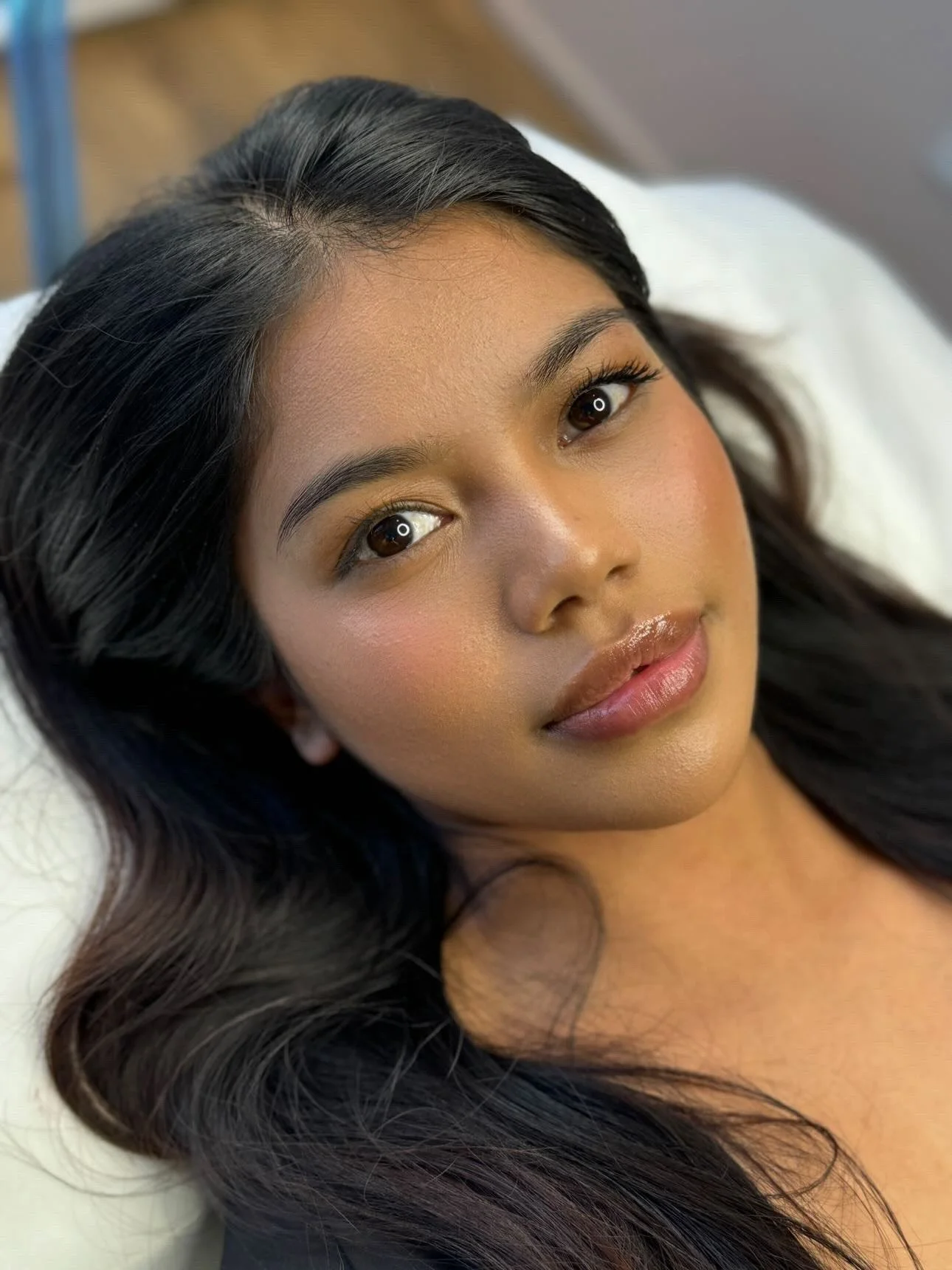 Close-up of a young woman before OKAPP's Cosmetic Eyebrow Tattoo