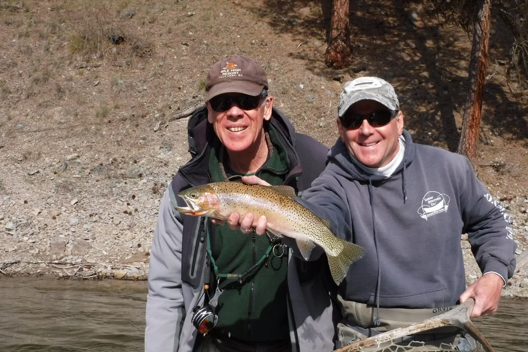 Tim and guest on Clark Fork River.jpg
