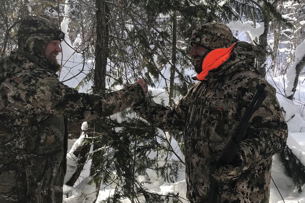 cat hunters shaking hands.jpg