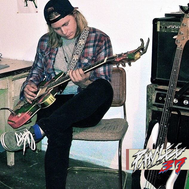 Panlee playing guitar