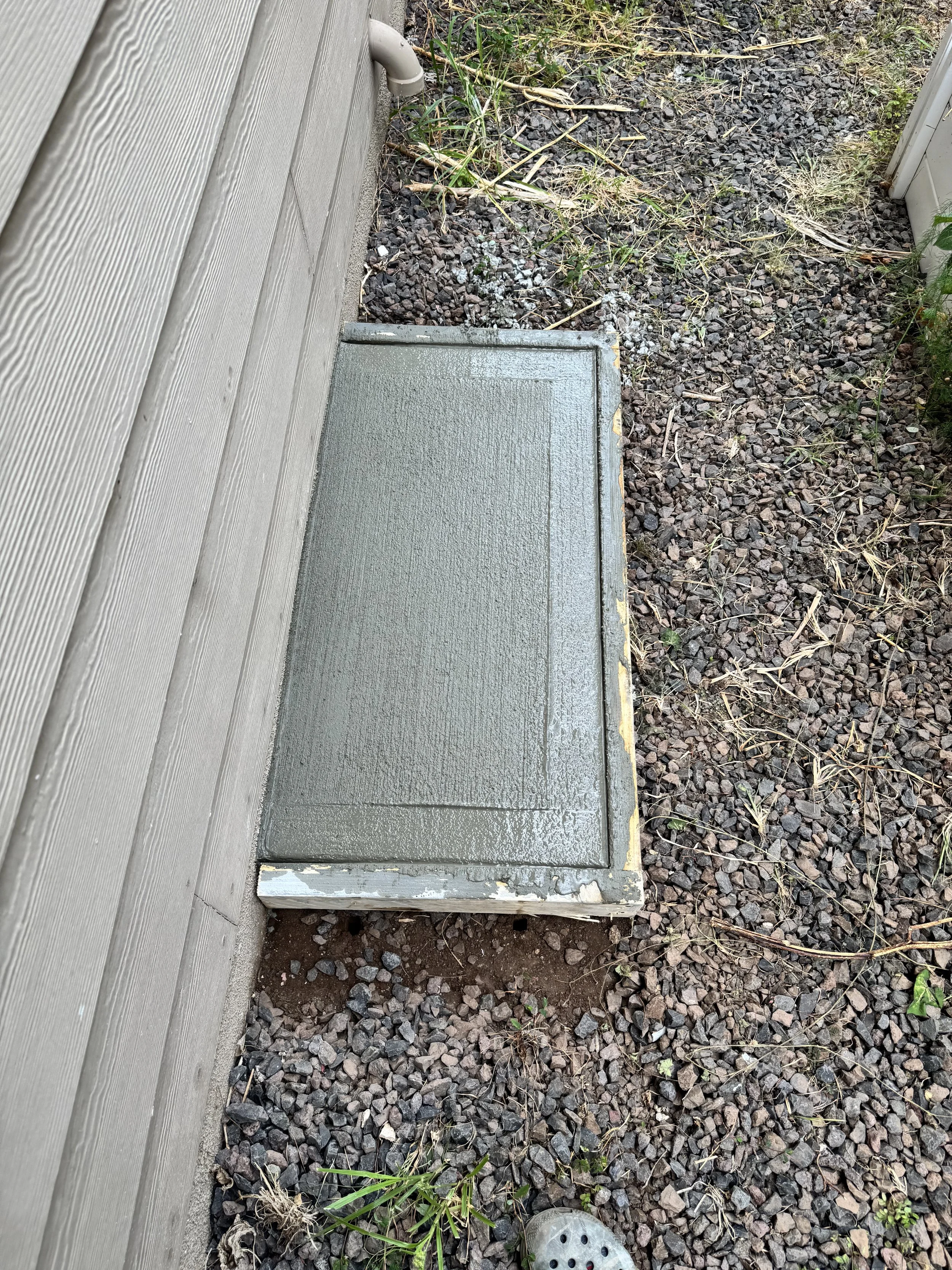 Concrete pad for solar batteries.