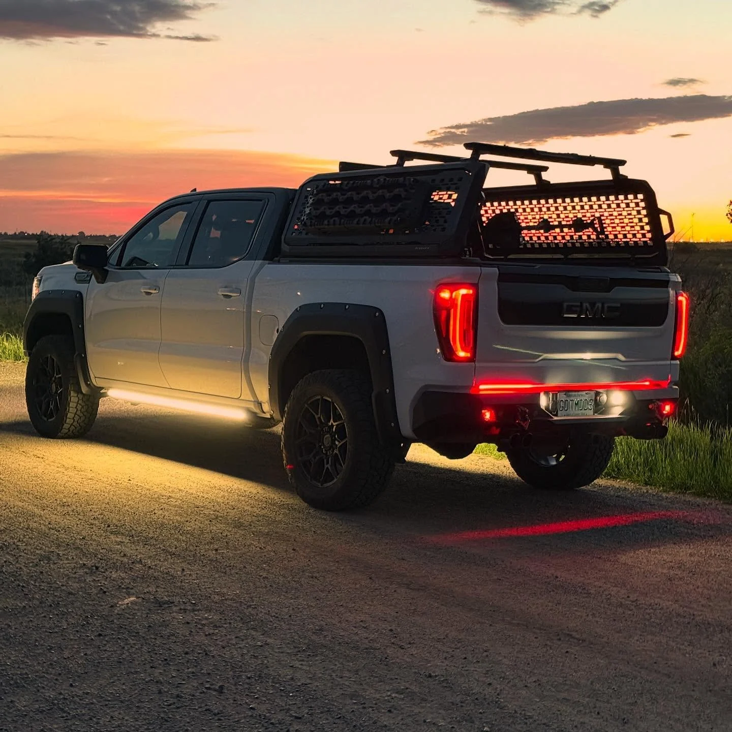 Kuat IBEX Bed Rack at Sunset 🌅 sitting on the amazing #egrrolltrac 👀#kuat #kuatracks #overland #at4 #sierraat4 #gmcat4 #gmcsierraat4 #sierra1500 #sierra #denali #6.2l #trucksofinstagram #trucks #truck #offroad #silverado #chevrolet #chevy #offroad 