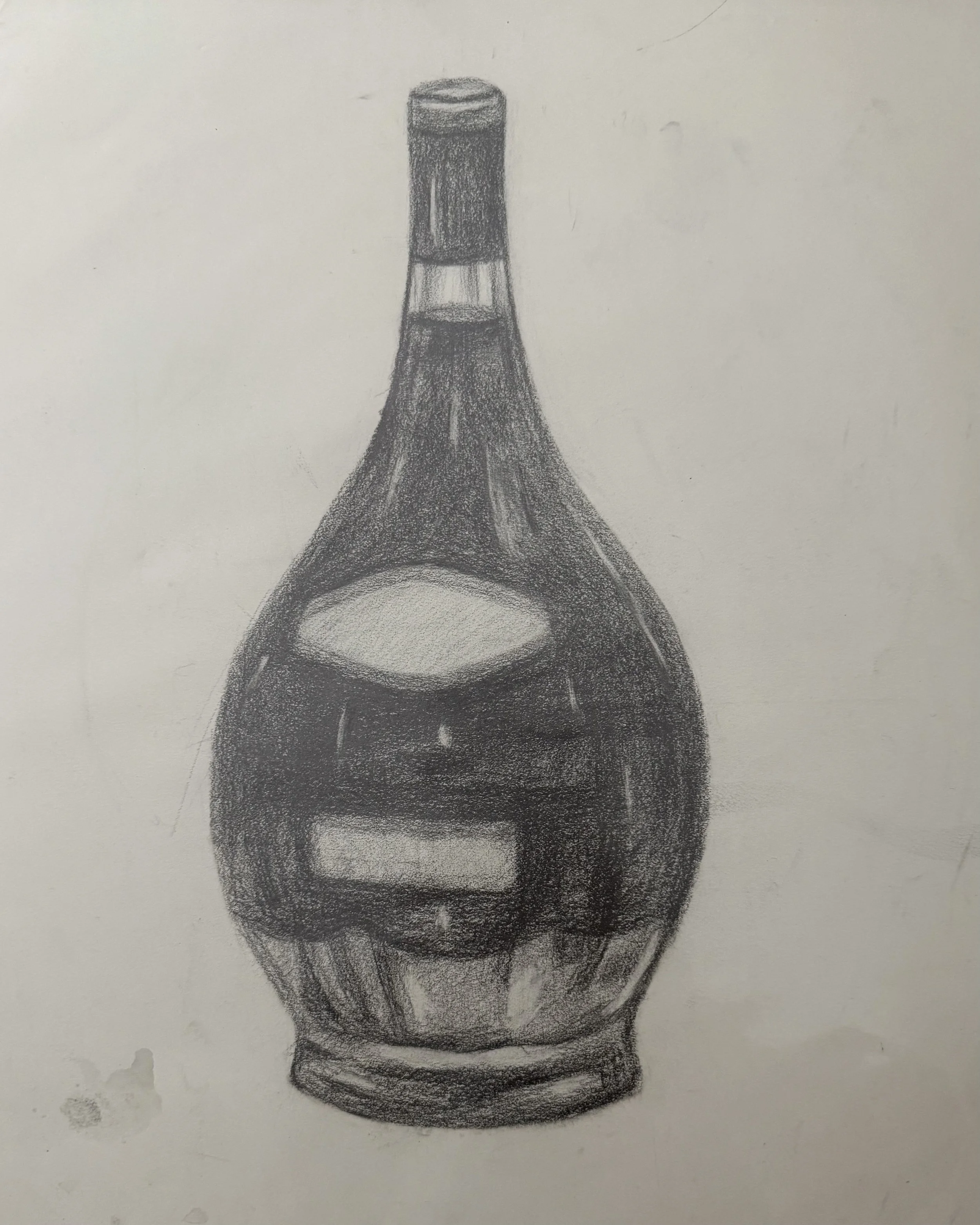 A detailed black and white pencil sketch of a rounded glass bottle with a narrow neck and a cork on top.