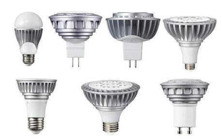 A collection of seven different LED light bulbs.