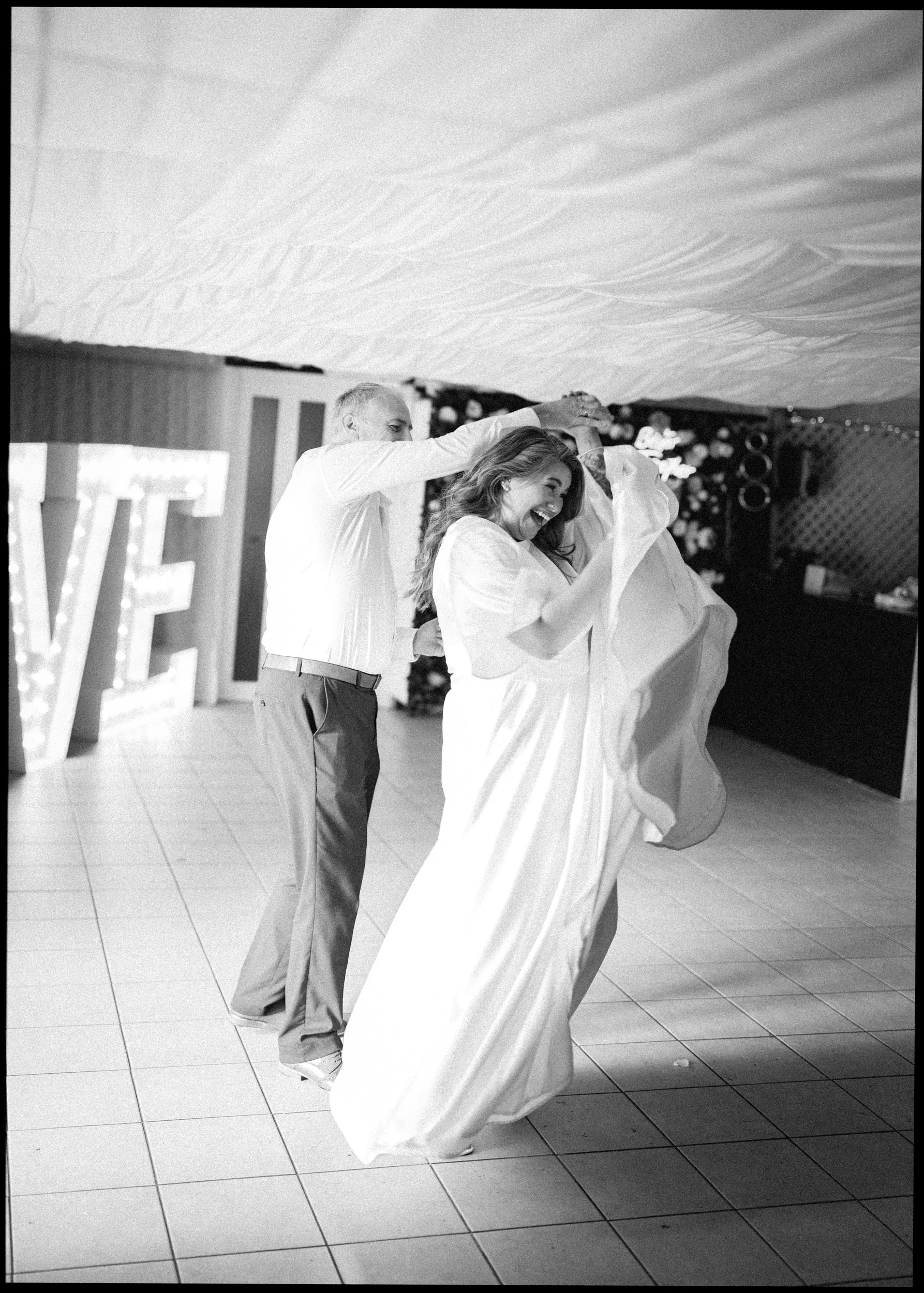 Kaiapoi Wedding, Canterbury, New Zealand. Bride dancing with her father at  wedding reception.