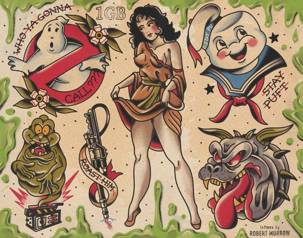 Collection of traditional tattoo-style illustrations including a ghostbuster logo with 'Who Ya Gonna Call?', a woman in a vintage pin-up pose, a cartoon baby with 'Stay Puft', a smiling styled lion, a detailed dragon head, a watermelon slice with 'St