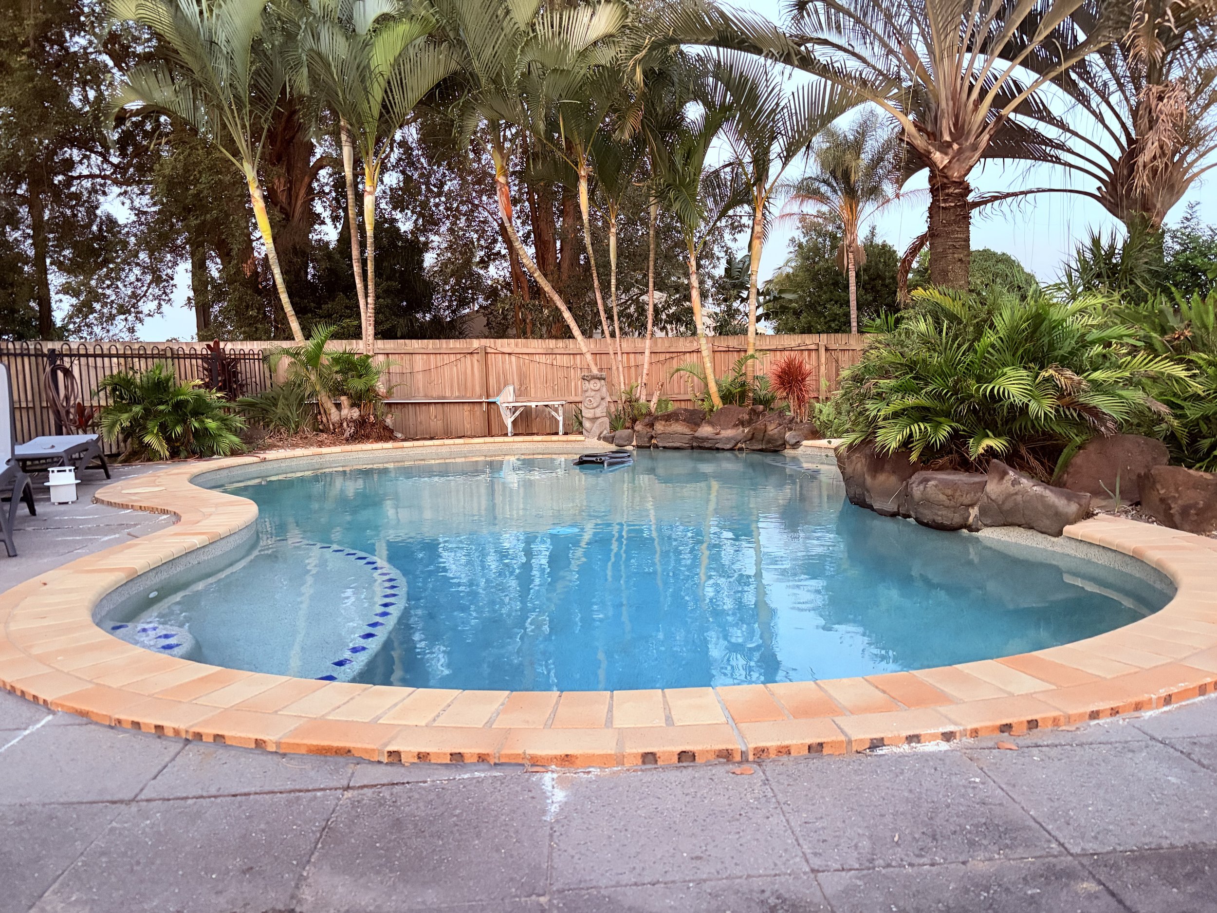 Backyard pool with tropical garden in Mountain Creek