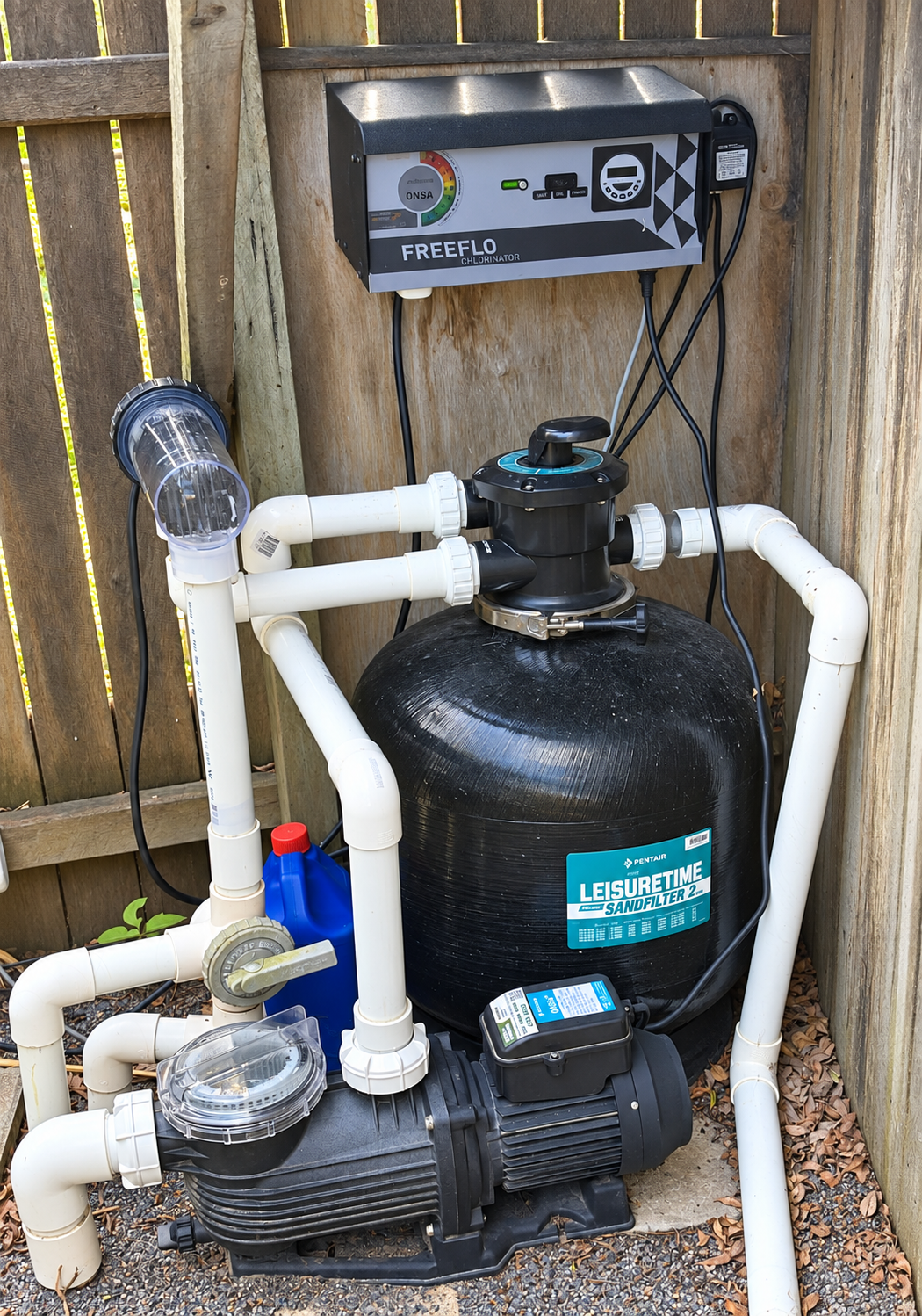 Pentair pool pump, sand filter and FreeFlo chlorinator