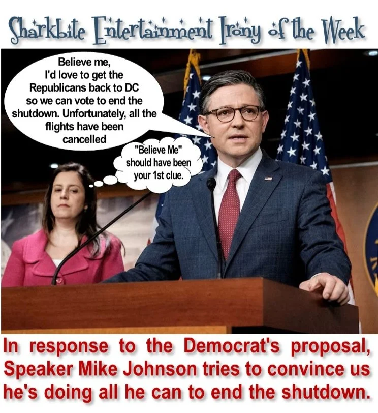 A satirical image titled "Sharkbite Entertainment Irony of the Week," showing two politicians at a press conference. The man, identified as Speaker Mike Johnson, is wearing a suit and glasses, standing at a podium with American flags behind him. A woman stands to his left, wearing a pink blazer. Speech bubbles show Johnson saying, "Believe me, I'd love to get the Republicans back to DC so we can vote to end the shutdown. Unfortunately, all the flights have been canceled." The woman's thought bubble says, "'Believe Me' should have been your 1st clue." The caption below reads, "In response to the Democrat's proposal, Speaker Mike Johnson tries to convince us he's doing all he can to end the shutdown."