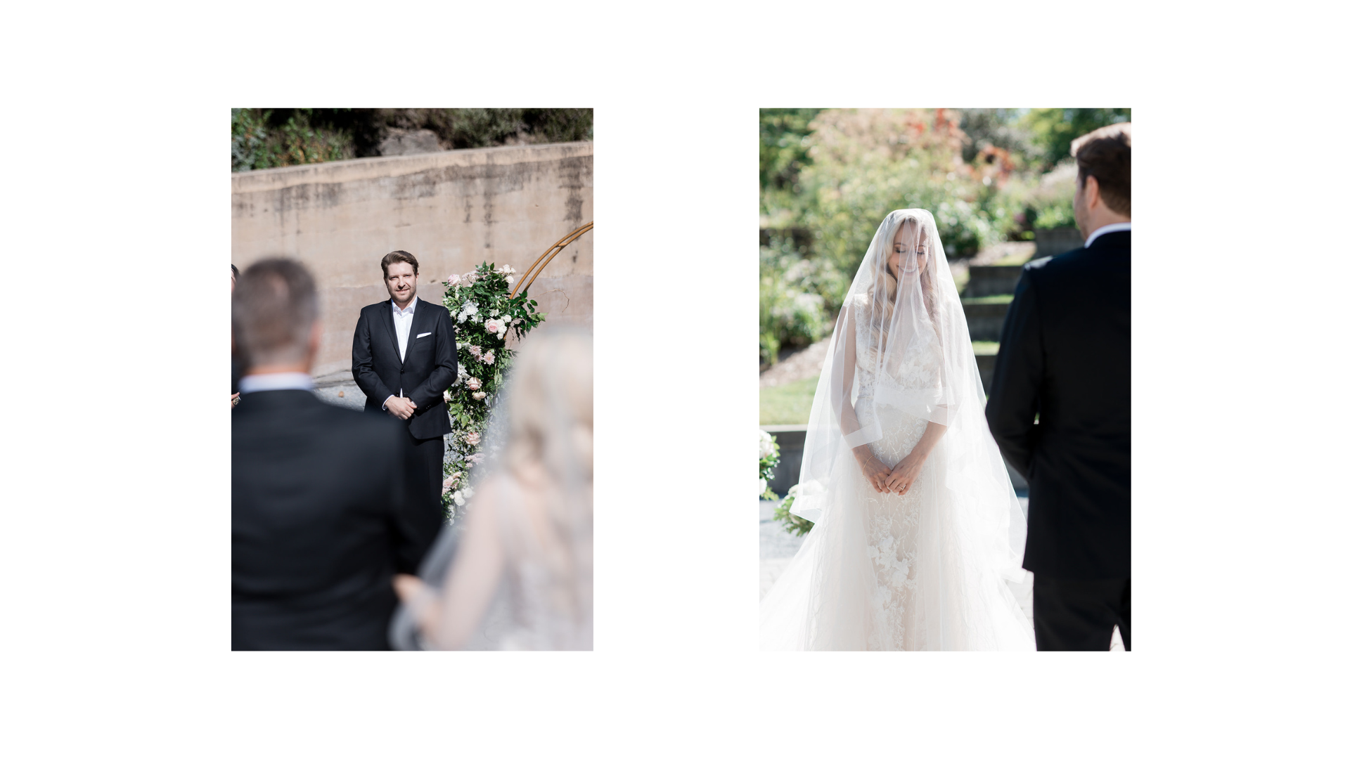 A wedding ceremony outdoors with a bride in a white lace dress and veil, standing in front of the groom in a black suit, with an officiant in a black suit and guests blurred in the foreground, and floral arrangements in the background at UBC