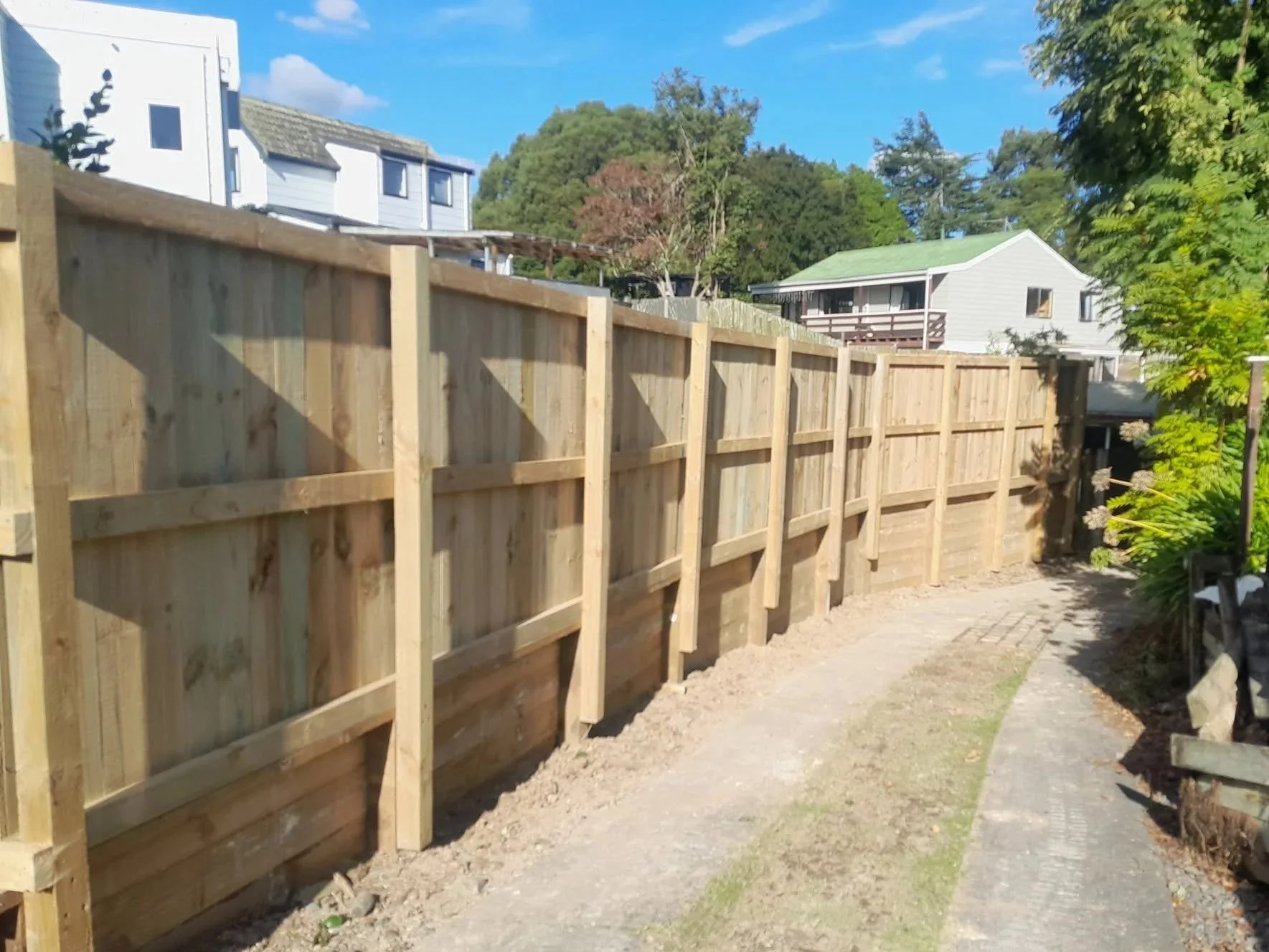 Wooden fence under construction on a residential Waikato property