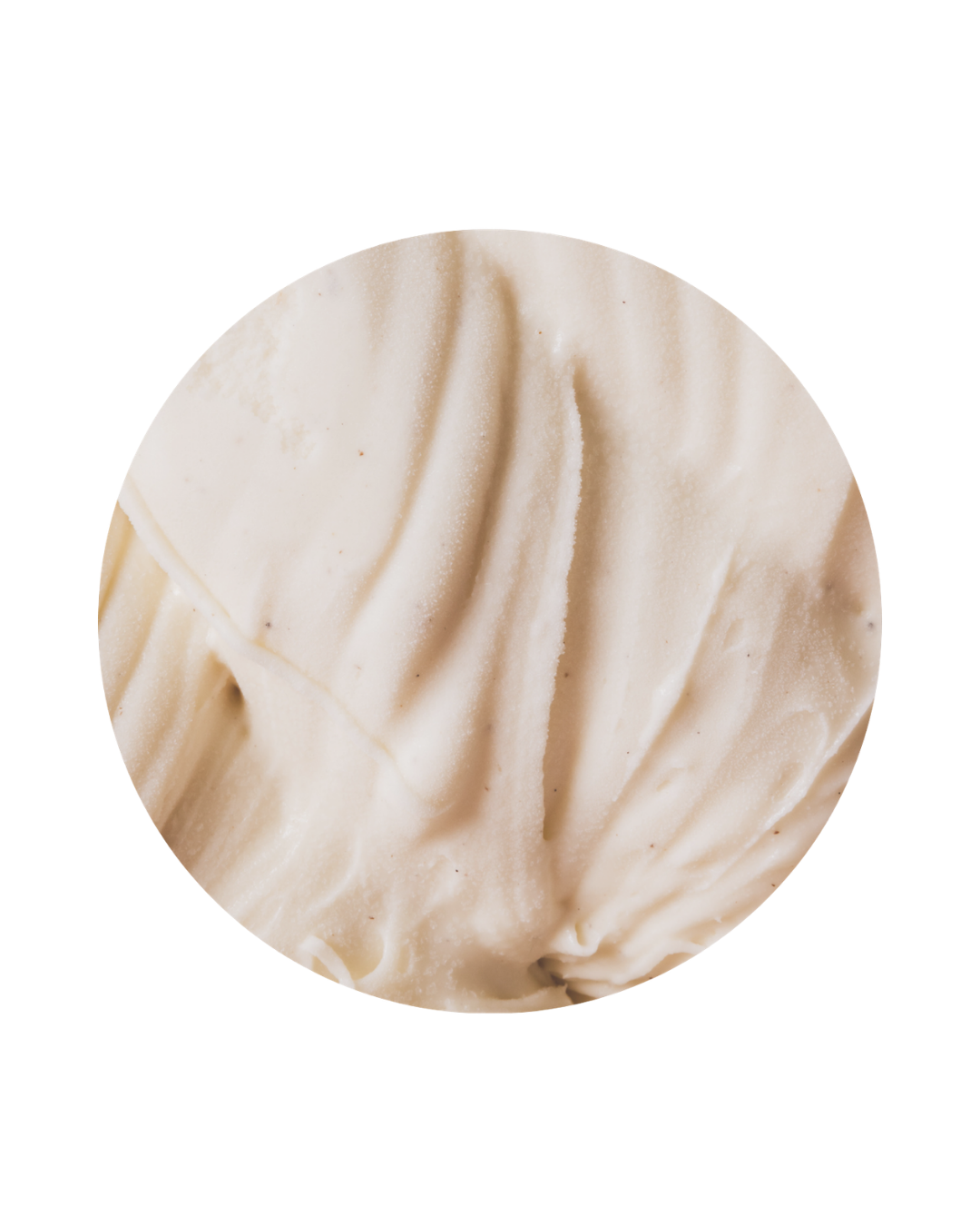 Close-up of a white chocolate truffle with creamy, textured surface