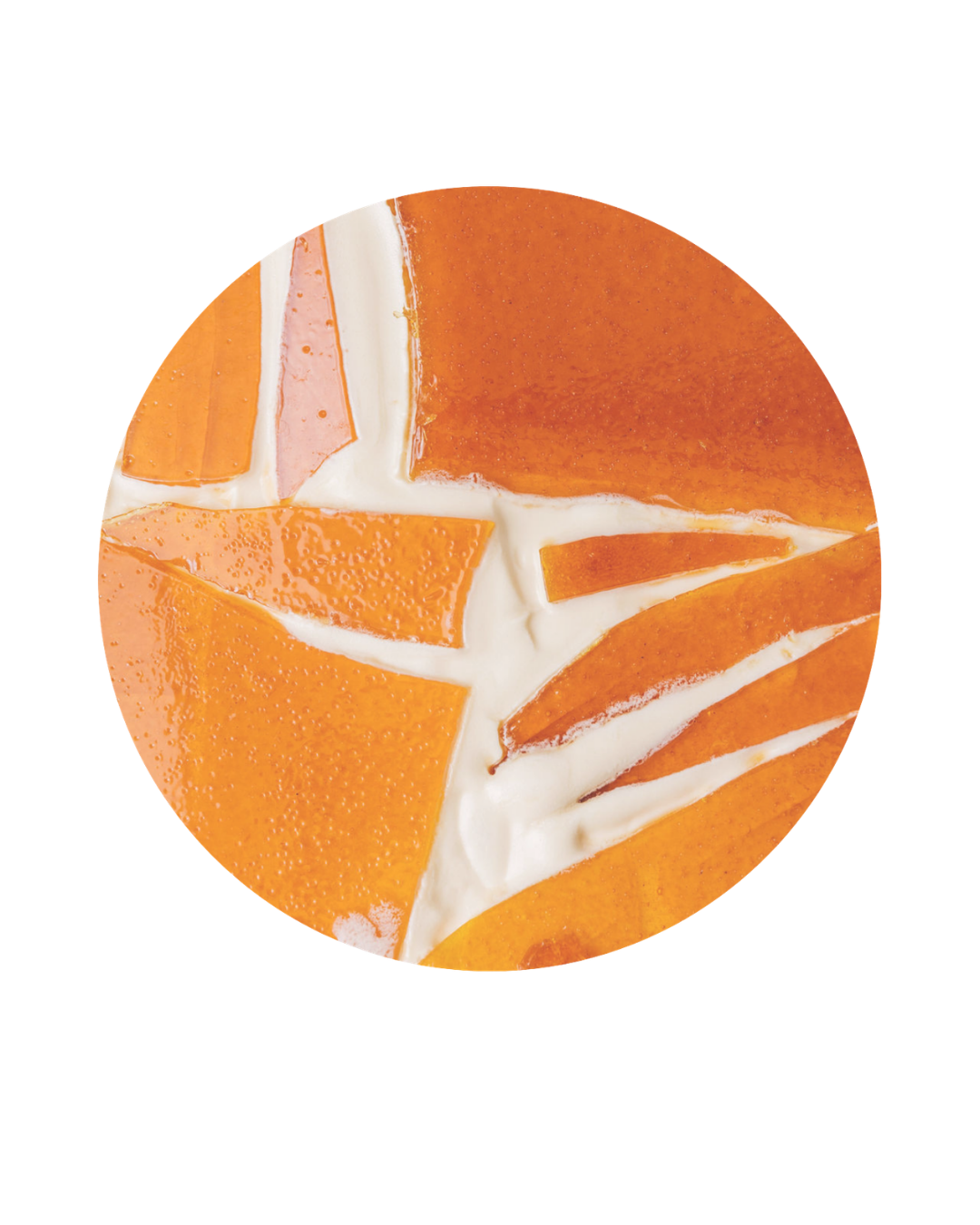 Close-up of a partially peeled orange with white pith visible, showing orange segments with some peeling.