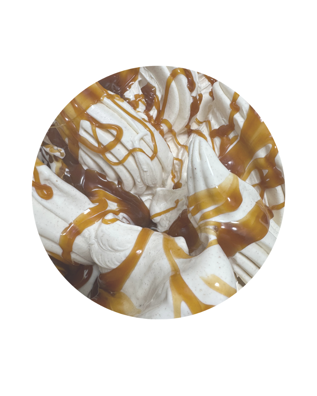 Ice cream sundae with vanilla ice cream, topped with caramel and chocolate syrup.