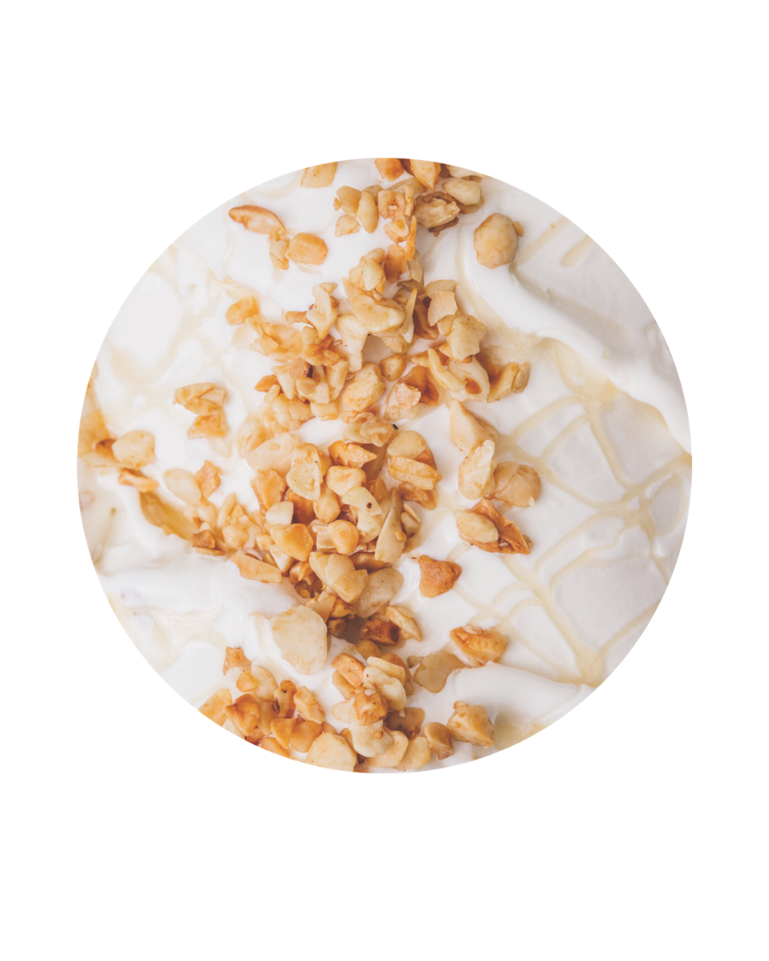 Ice cream topped with chopped nuts and a drizzle of caramel.