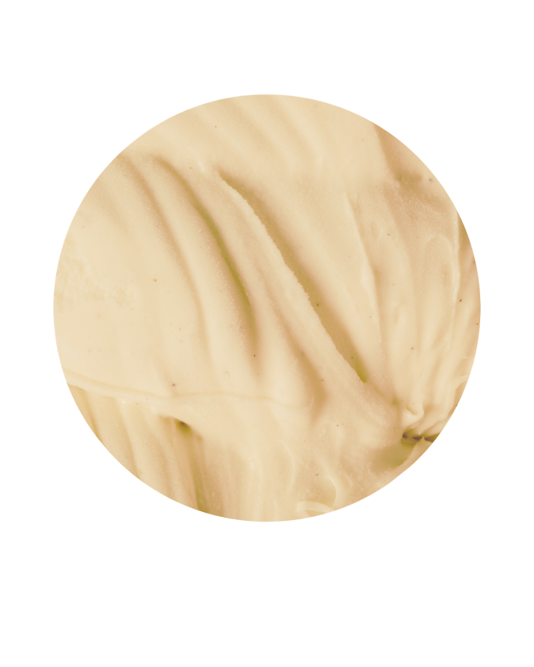 Close-up of a round white chocolate truffle with a marbled pattern.