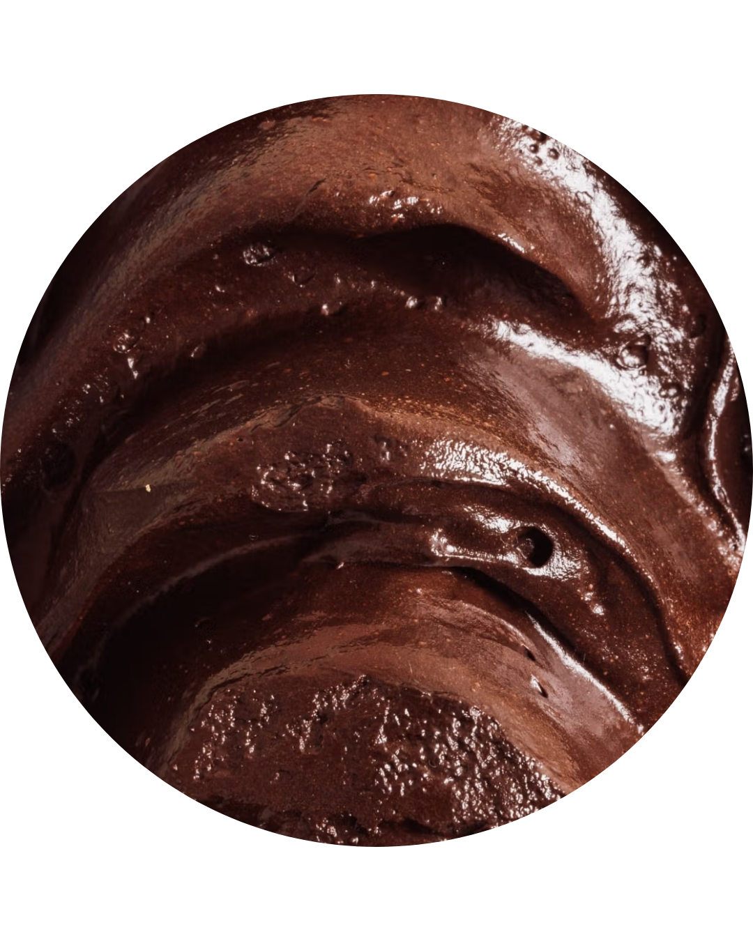 Close-up of a person's lips and mouth, with shiny, dark, and moist skin.