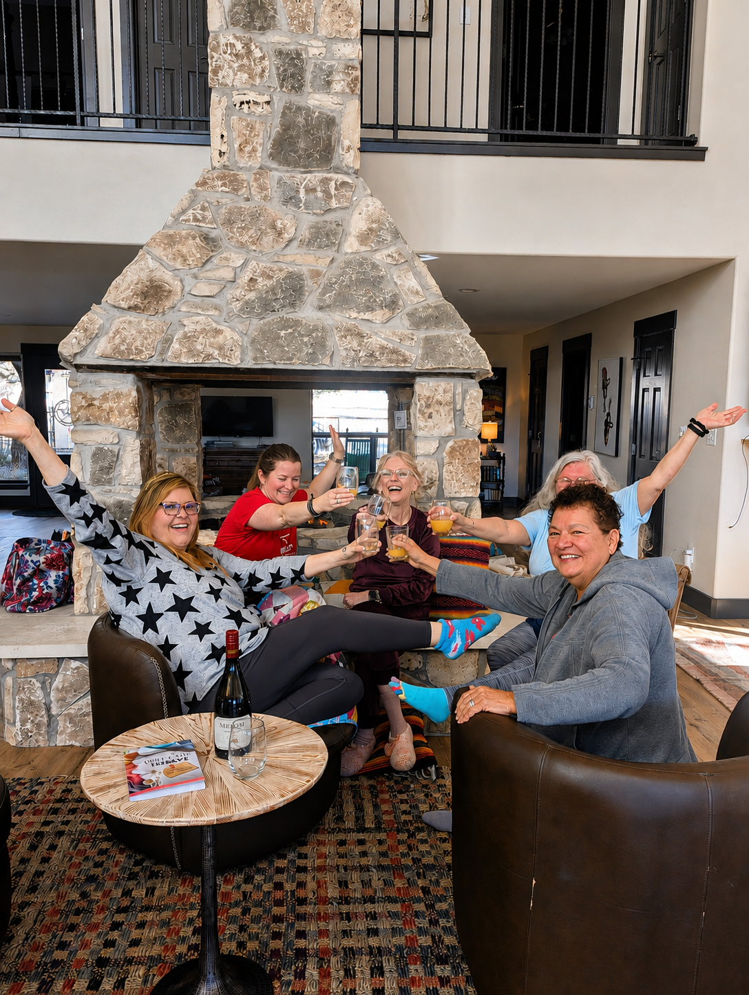 Group of friends relaxing together in the Main House living area.