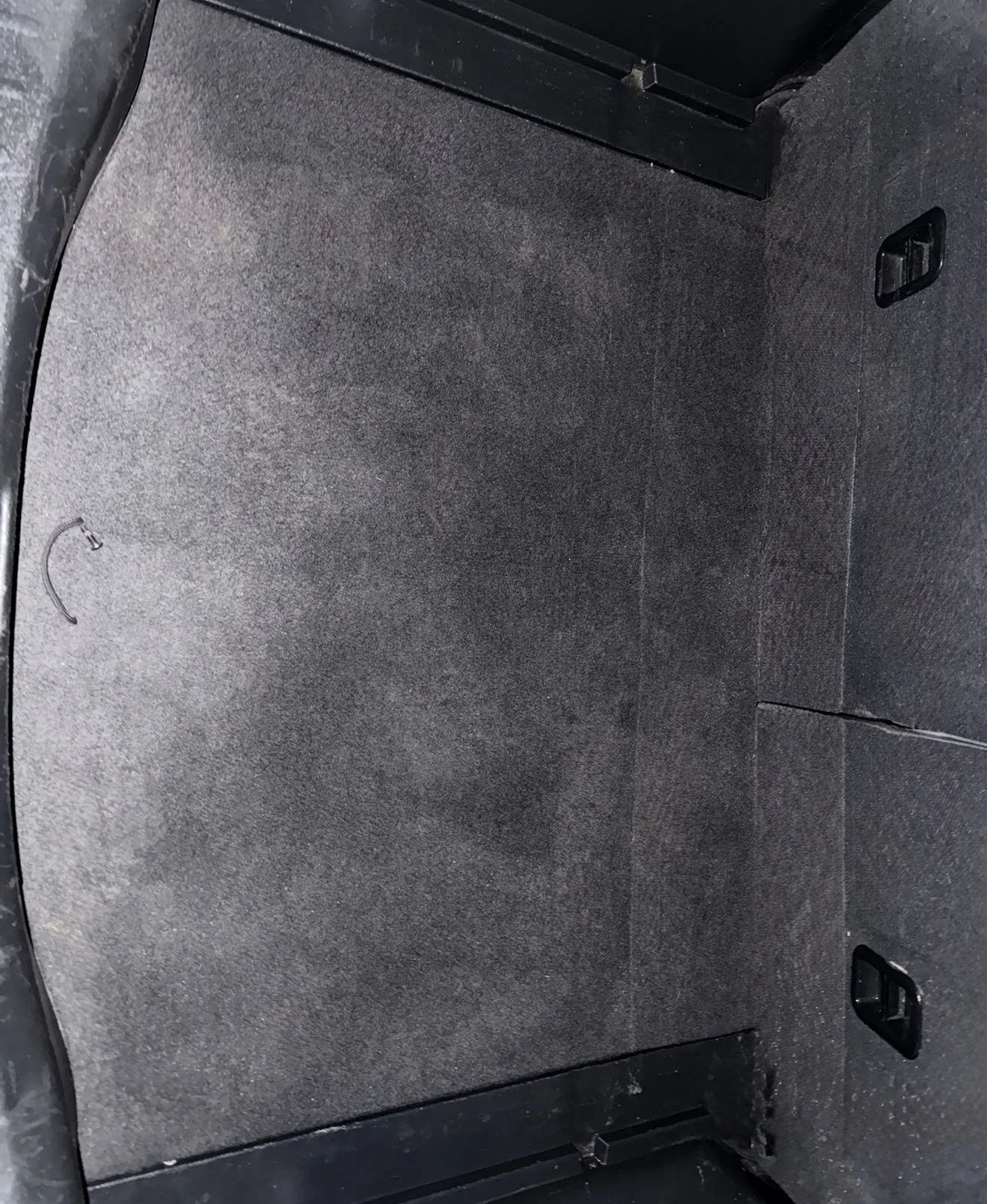 Spotless trunk carpet in a Honda Fit after a deep steam clean and vacuum by Results Detailing and Pressure Washing in Ithaca, NY.