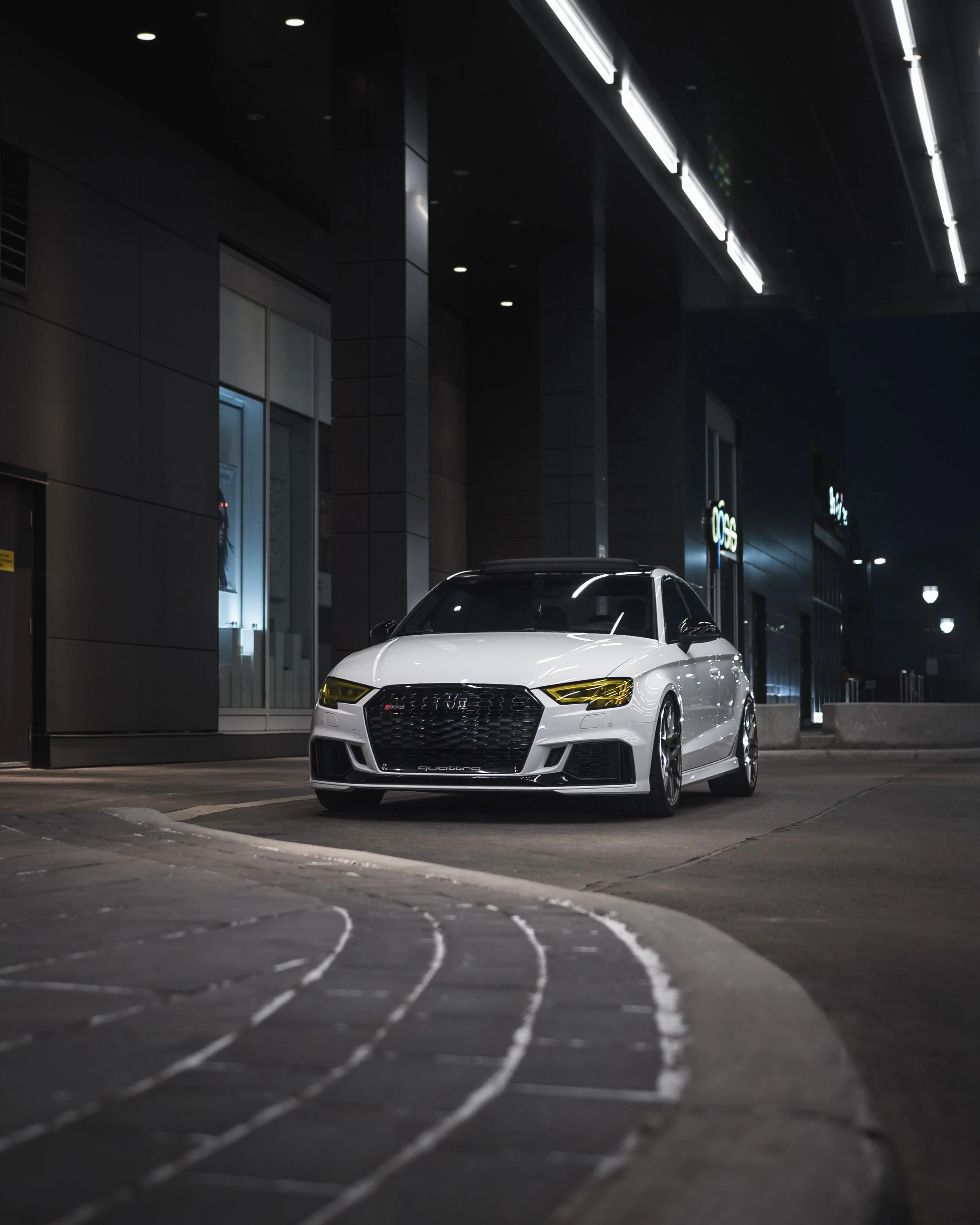 Professional mobile auto detailing on a white Audi by Results Detailing in Ithaca NY