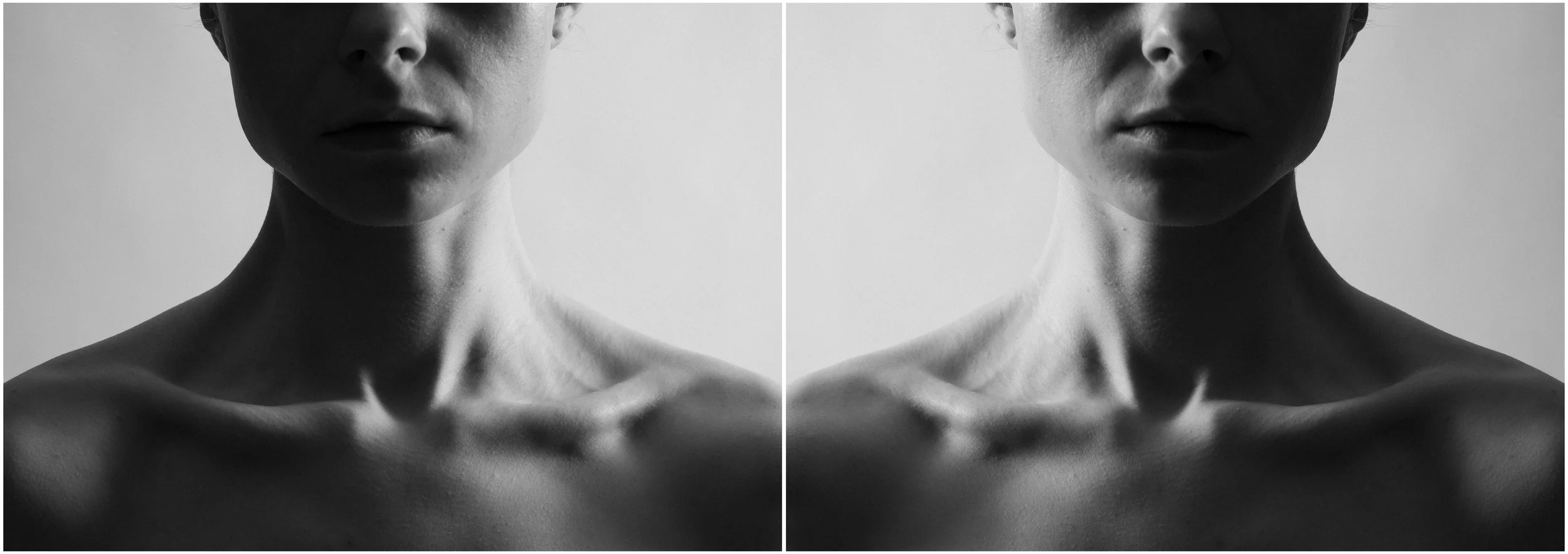 A black and white mirror-reflection photographic portrait of a young woman. A close-up, cropped portait showing her neck and clavicule. Very strong shadows and contrasts.