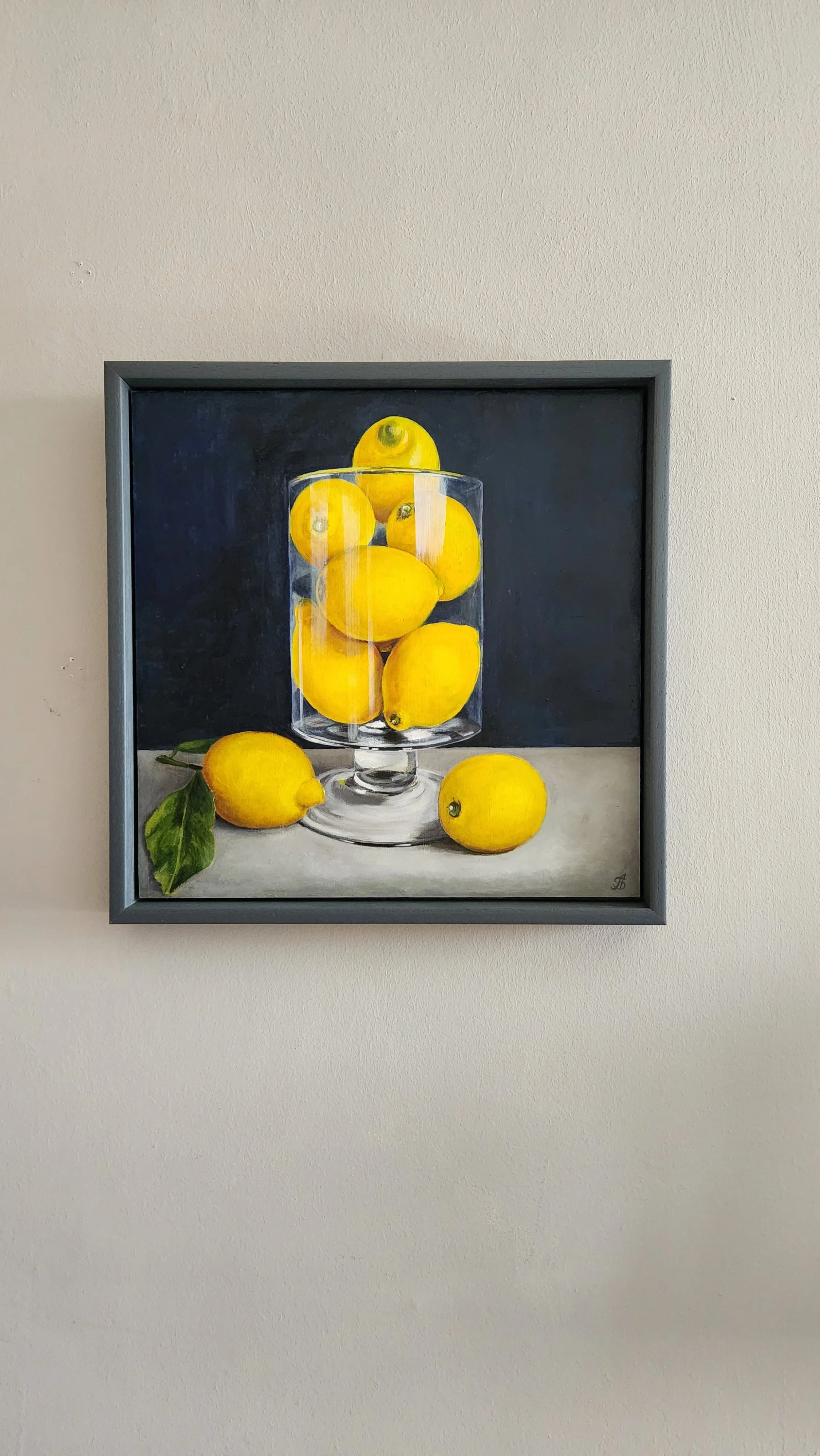 Lemons in a glass vase