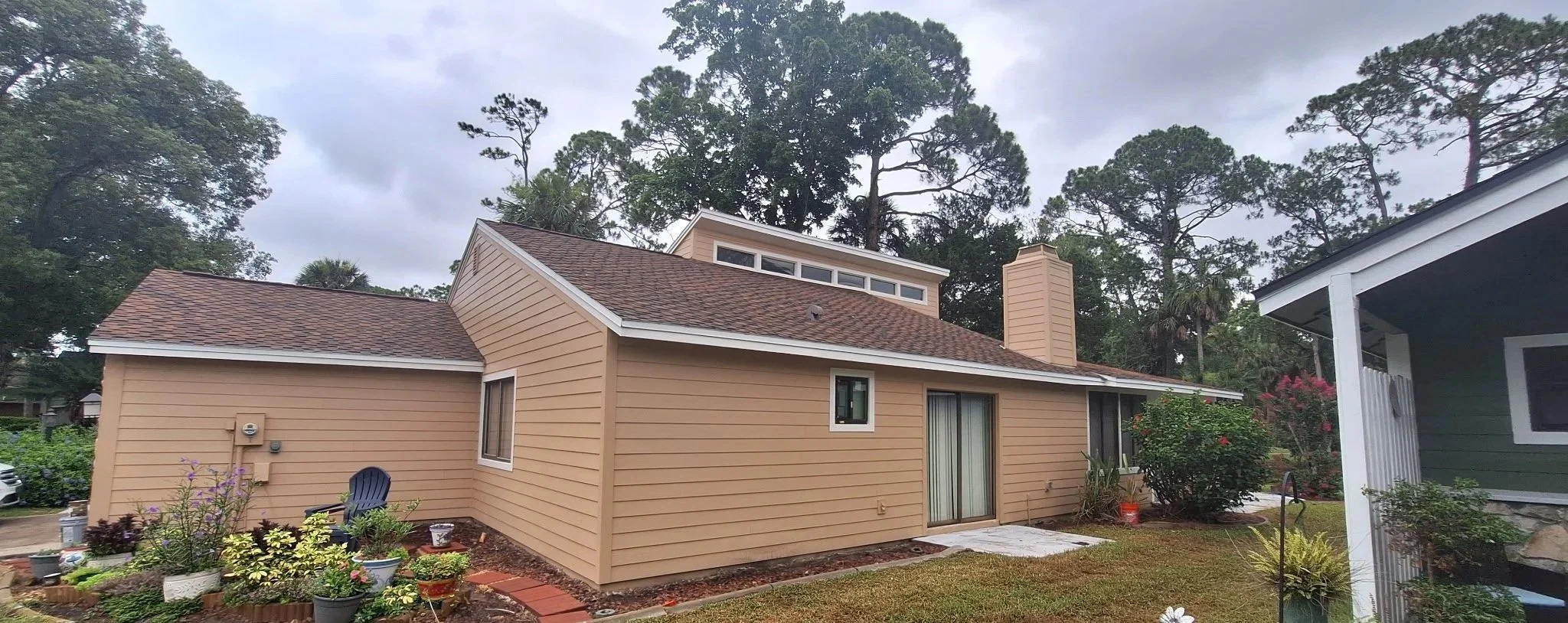 South Daytona home exterior rear view after painting neutral tones