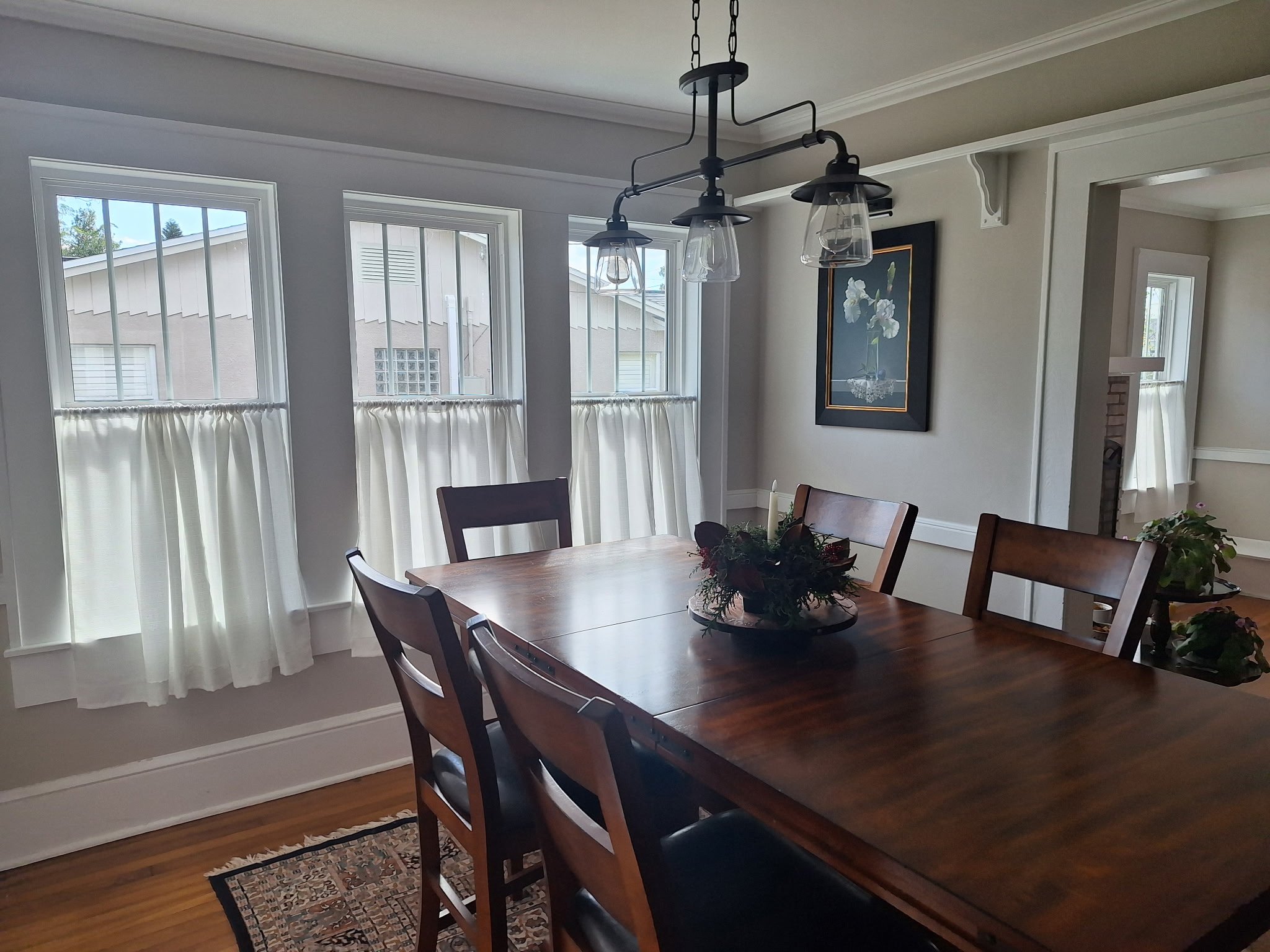 Dining room interior painting in East Colonial Orlando with soft neutral walls