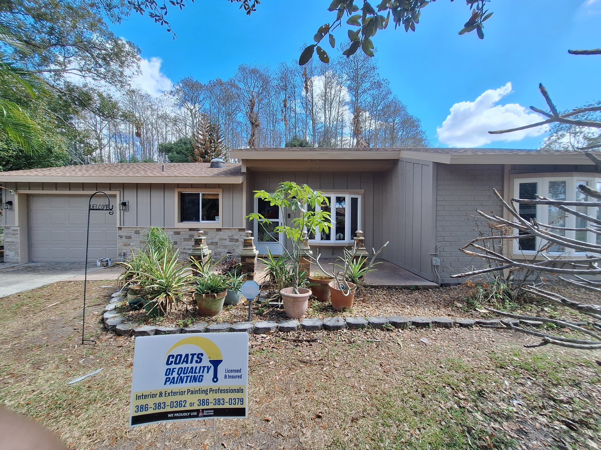 freshly painted modern taupe exterior Orlando Florida home