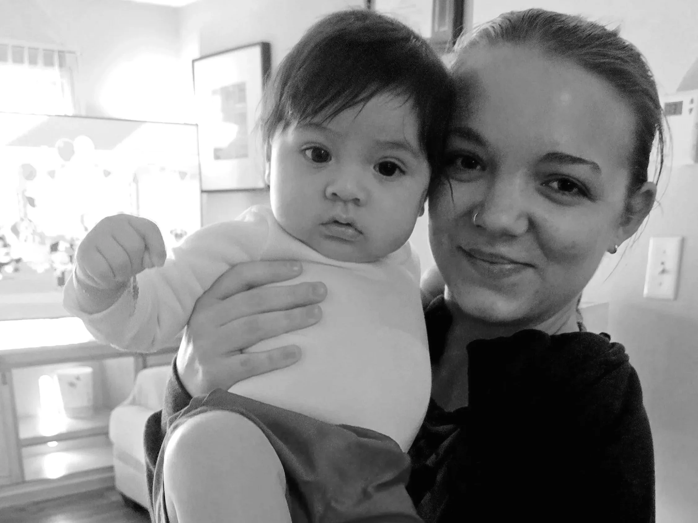 Postpartum Doula, Bella Love, PCD (DONA) provides comfort and ease to families across Western North Carolina.