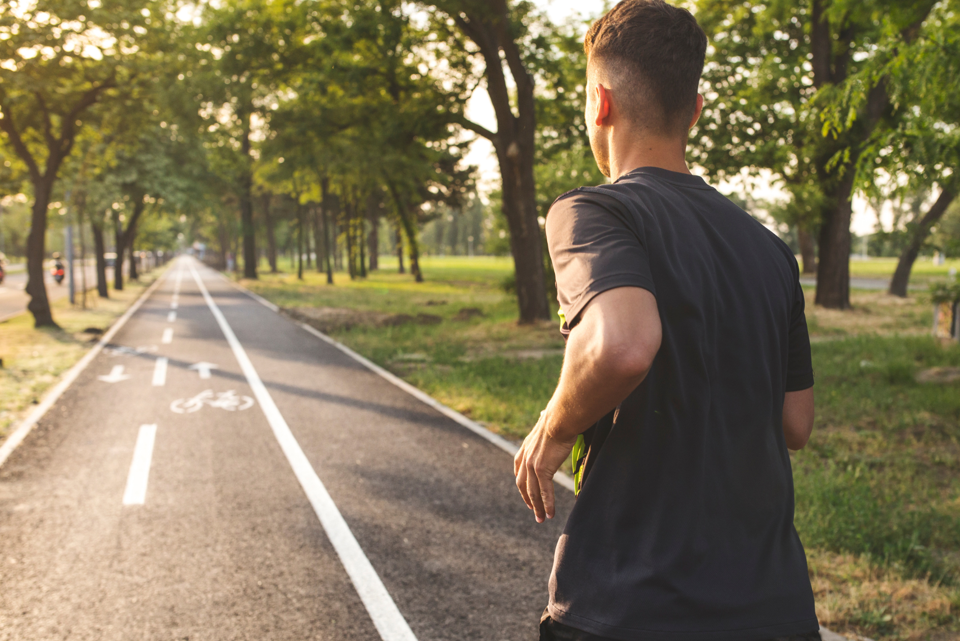 Healthy man jogging outdoor, reflecting energy and vitality
