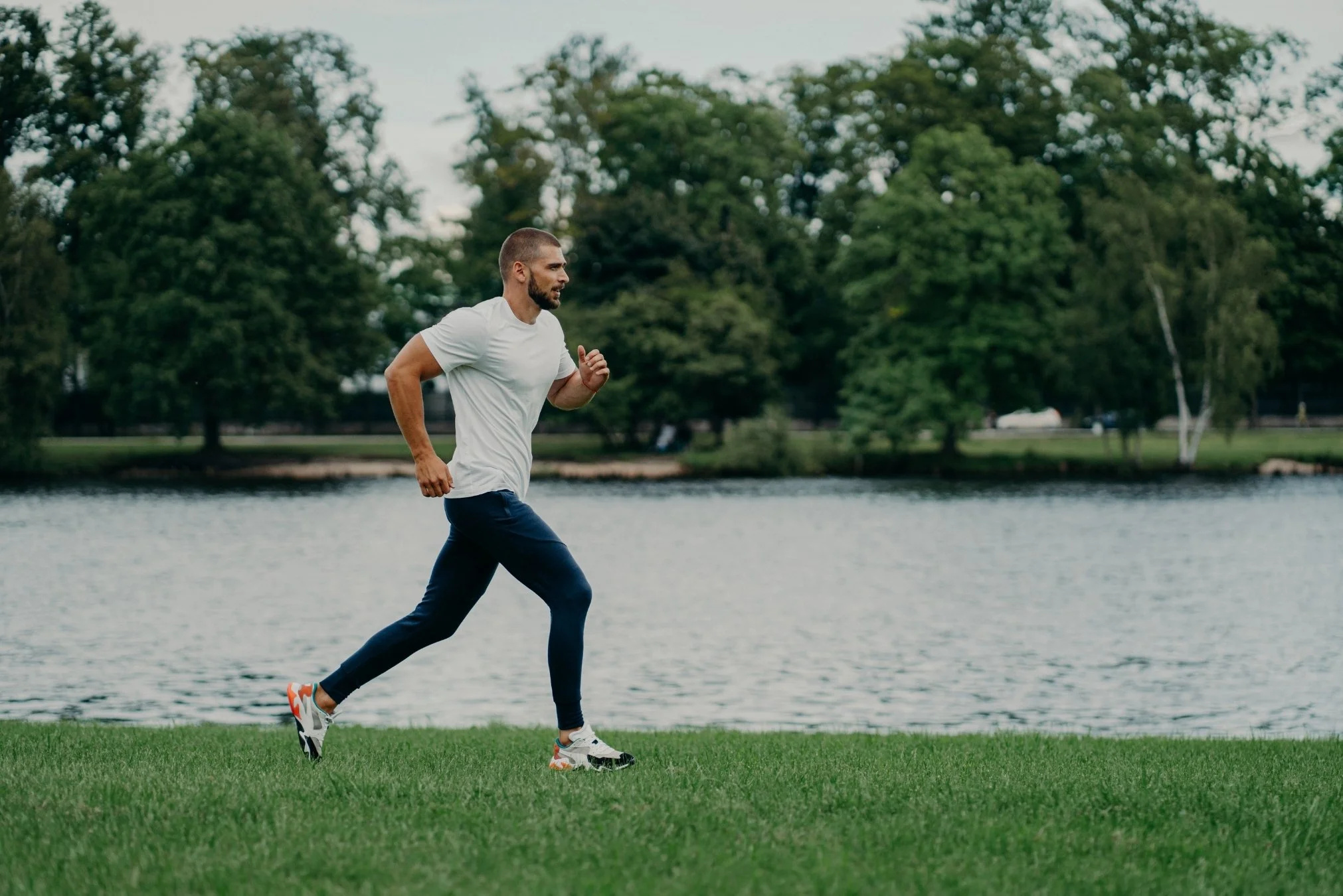 Man running with purpose, symbolising executives building and safeguarding wealth