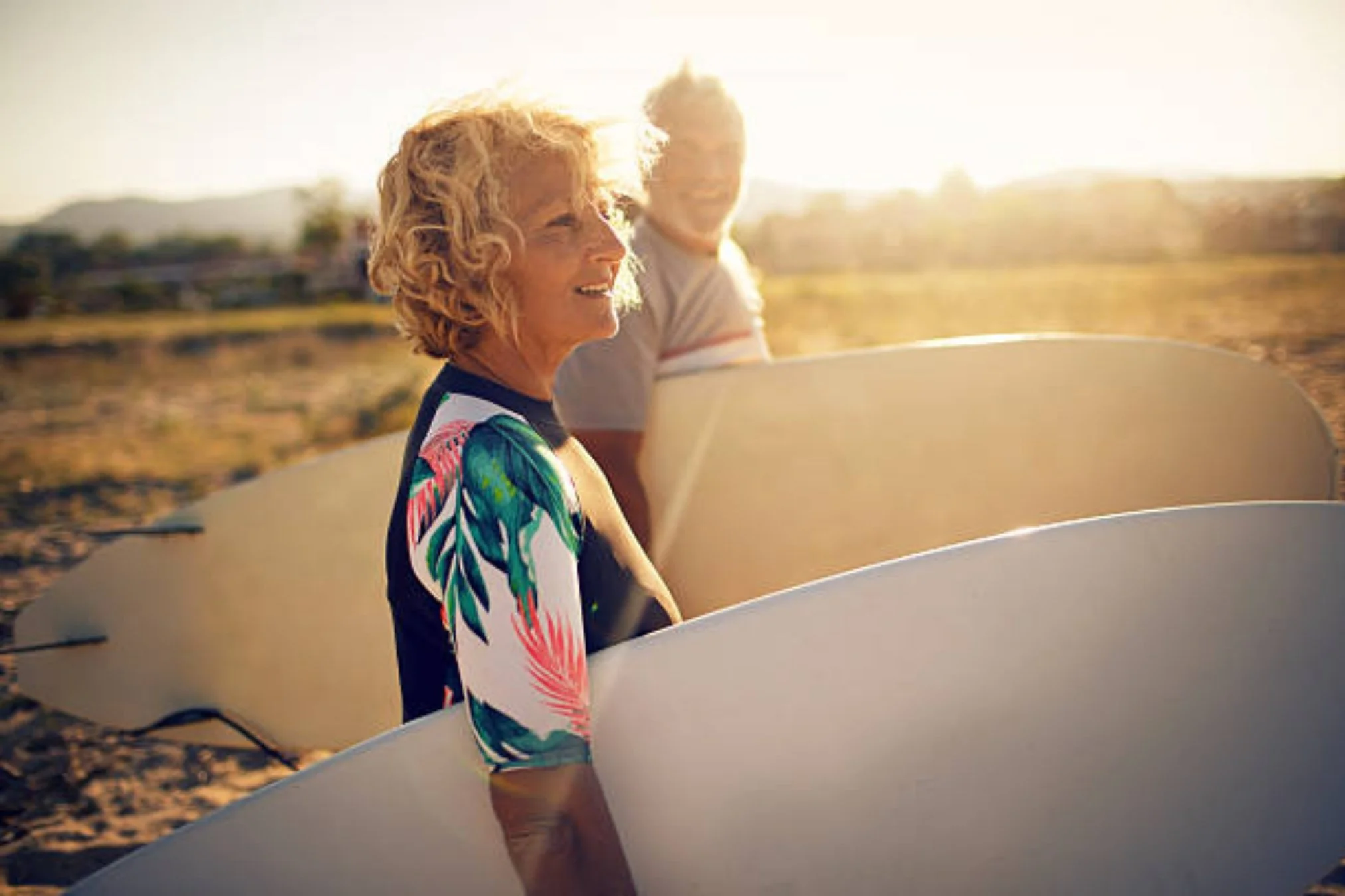 Smiling elderly couple covered by senior life insurance plan