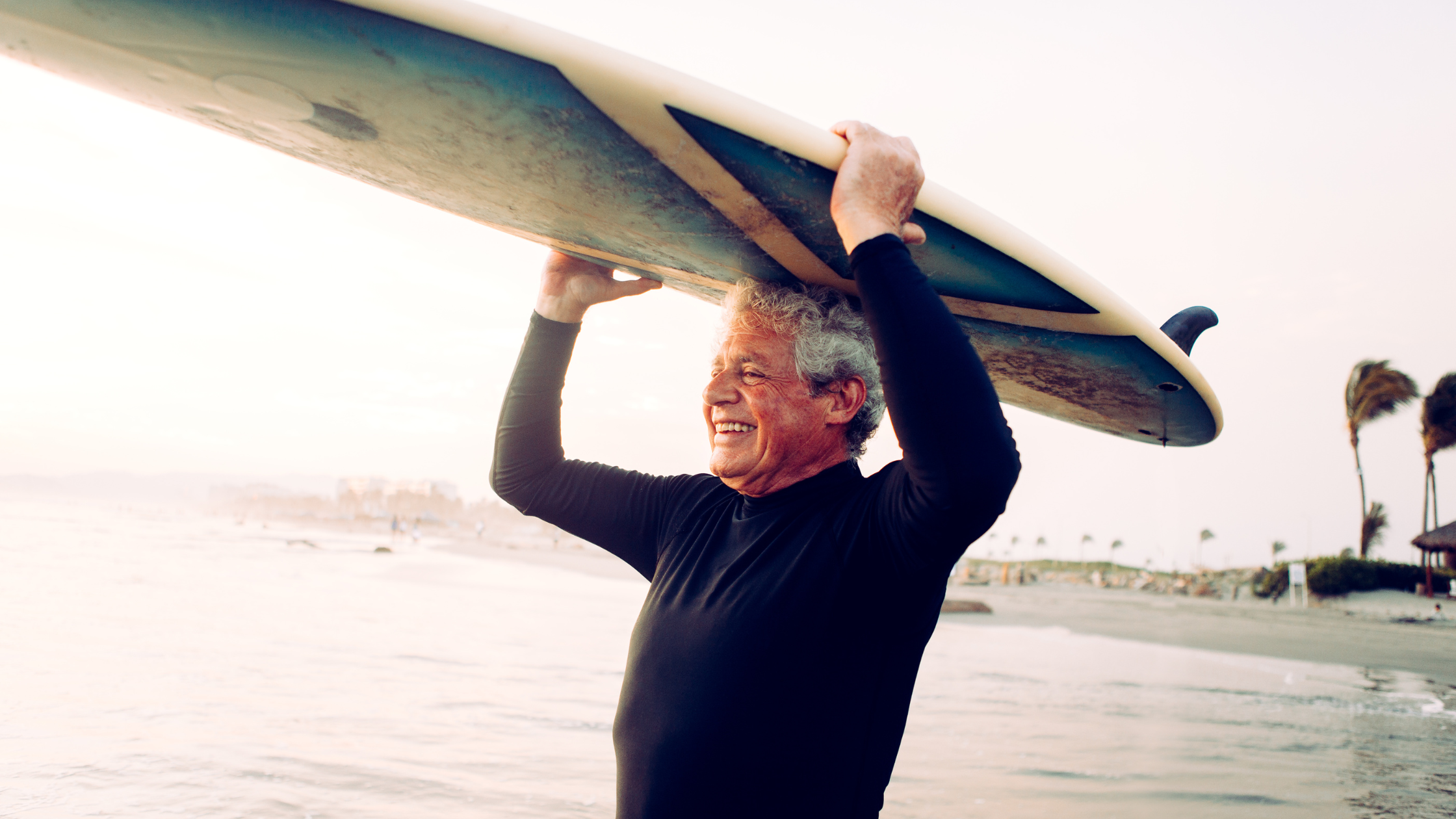 Smiling elderly covered by senior life insurance plan