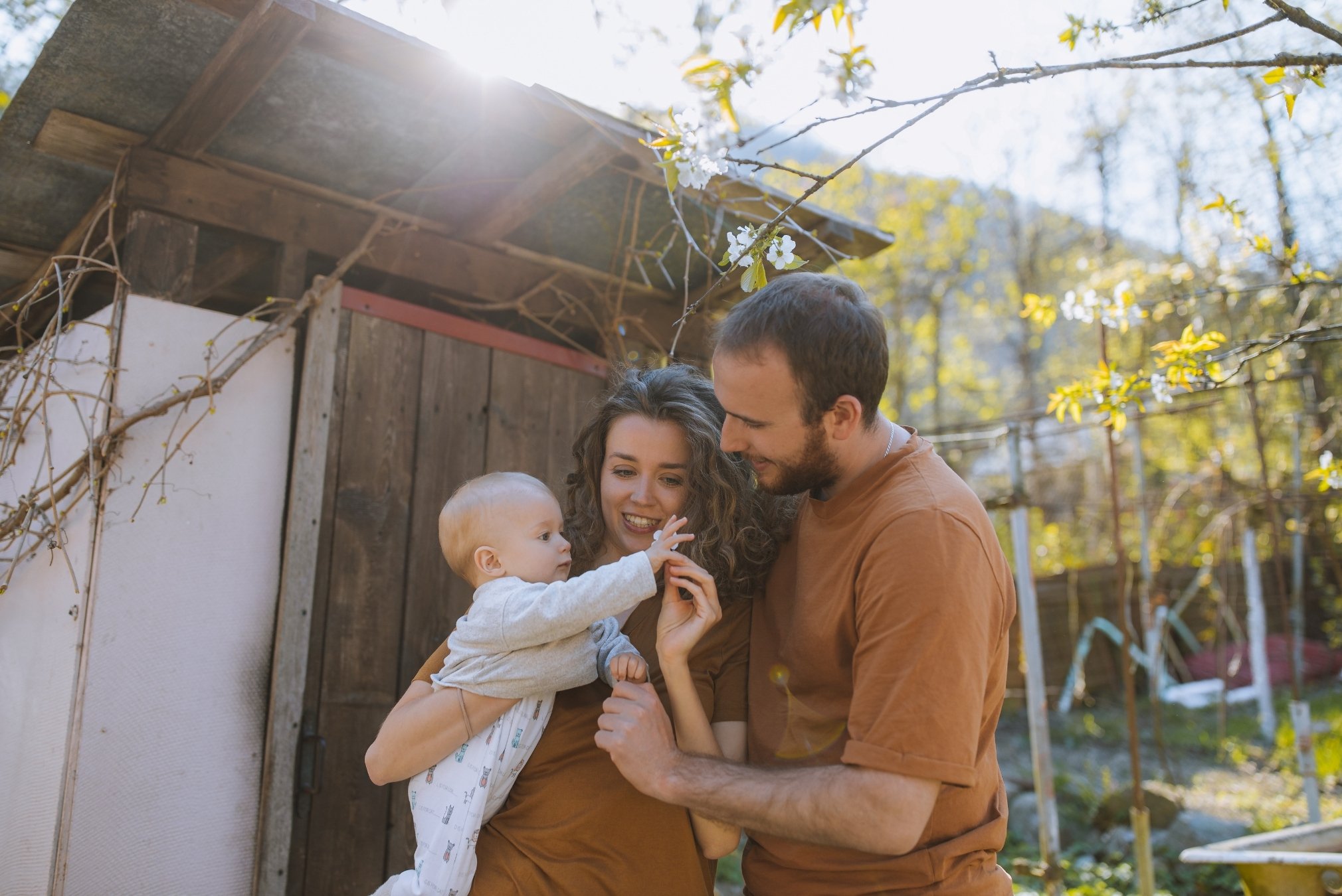 Happy family in their new home, covered by insurance