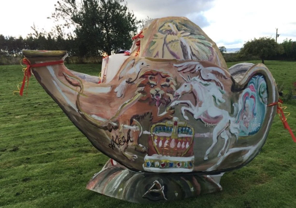 Aladdins lamp gold side wm 247kb.jpg