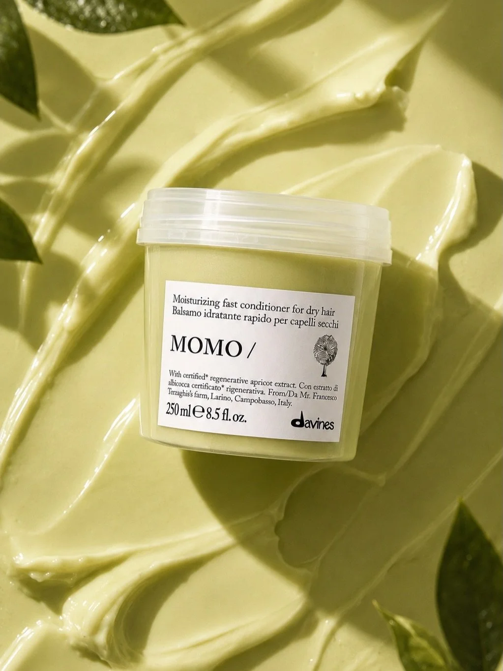 SUMMER HYDRATION, REDEFINED.

Sun, sea water, chlorine and heat can leave hair feeling dry, tangled and difficult to manage.

The Davines MOMO Conditioner is enriched with regenerative apricot extract and designed to restore softness, hydration and n